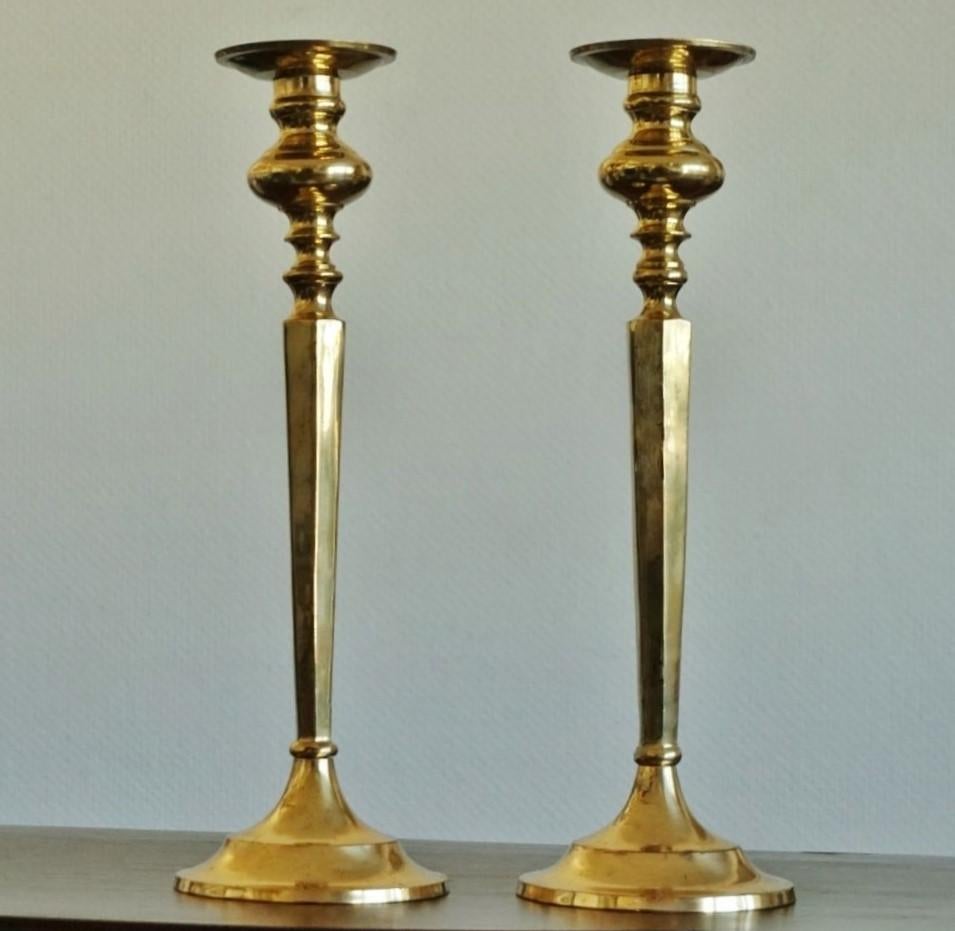 Late 19th century pair of French tall solid brass altar candleholders.
Measure: Height 14.50 inches (37 cm)
Base diameter 4.75 inches (12 cm)
Weight 1.875 lbs. each candelabra (850 g).