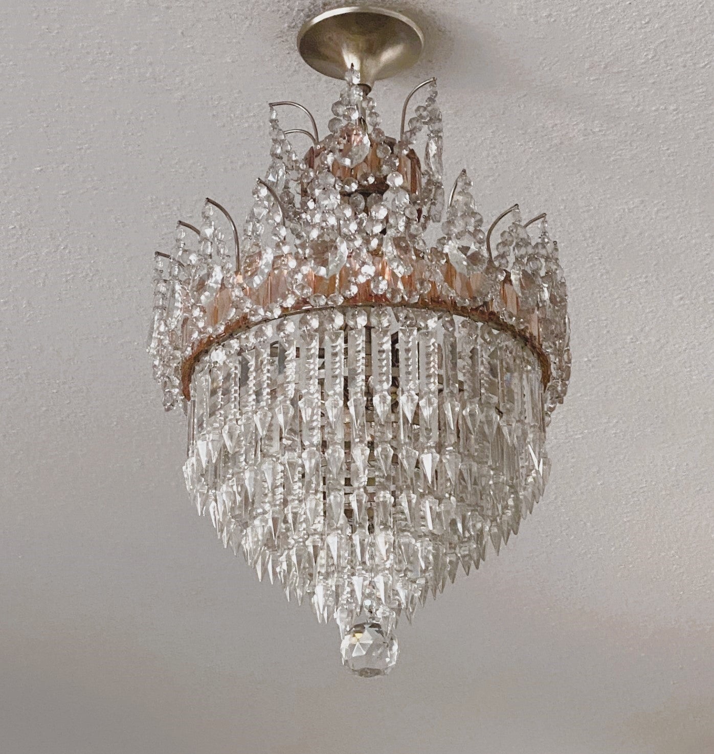 A wonderful and rare pure crystal six-tier waterfall flush mount or chandelier, France circa 19130-1939. Chrome mounted, frames covered with large pink faceted crystals surrounded by clear crystals garlands - impressive lighting effect!
This flush