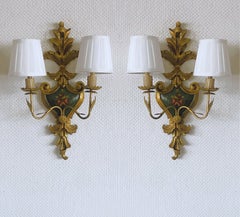 Pair of French Gilt Wrought Iron Carved Wood Two-Arm Electrified Wall Sconces