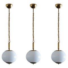 Set of Three Italian Art Deco Opaline Glass and Brass Pendants, 1950's
