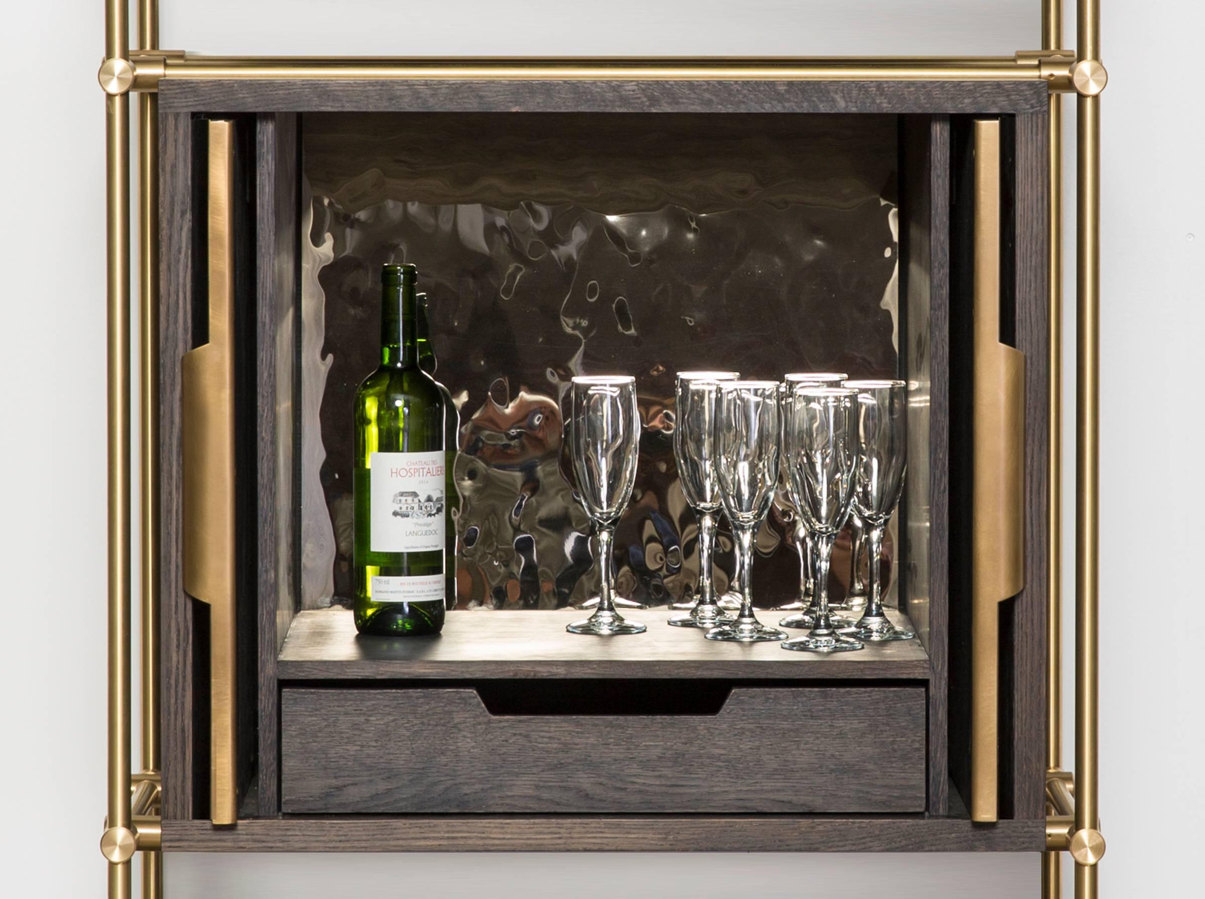 This single bay collector’s shelving unit highlights our carved oak wine shelves as a perfect way to store and display your favorite bottles. Our precision machined brass fittings make each shelf easily adjustable and removable adding to the curated