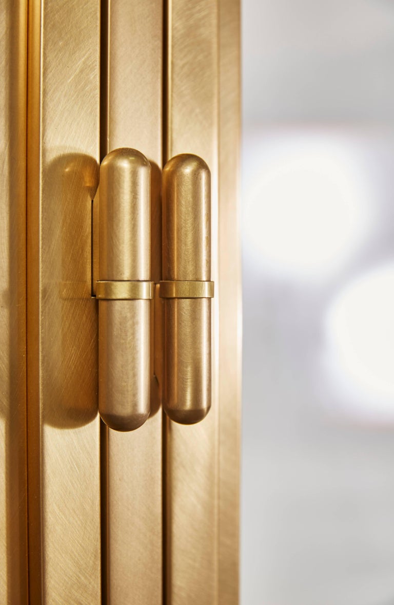 Clean Modern Bronze Doors with Machined Bronze Door Pulls and Hinges