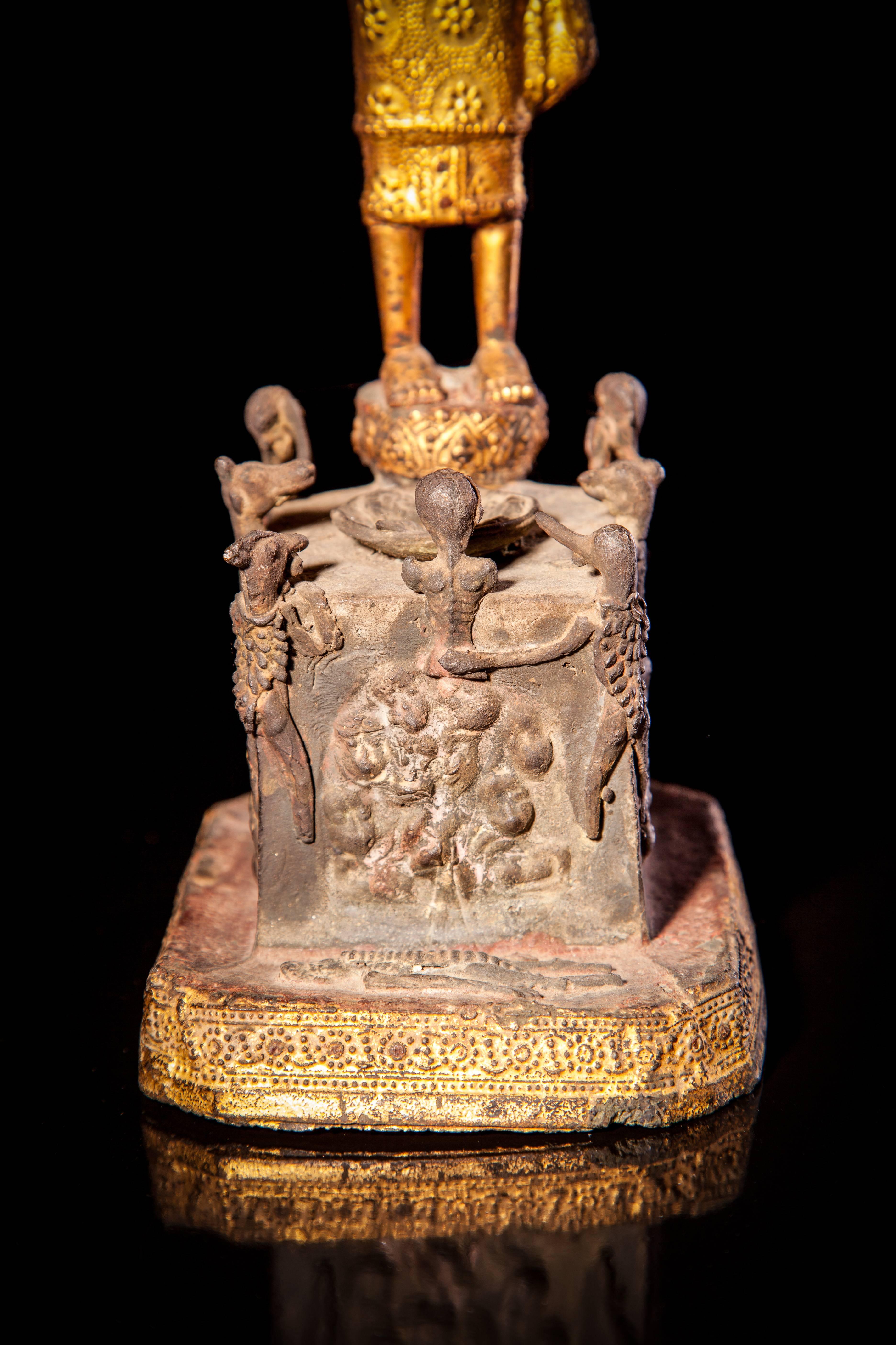Bronze Phra Malai visiting hell Thailand, Bangkok style, Ratanakosin period, second half of the 19th century. Measures: H 28 cms, 11 ins
An exceptionally fine gilded and lacquered bronze figure of the venerable monk Phra Malai visiting hell,