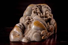 Large Carved Celadon and Russet Jade Boulder Qing Dynasty, Kangxi Period