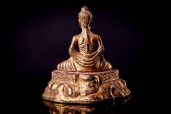 Two Gilded and Lacquered Bronze Fasting Buddha