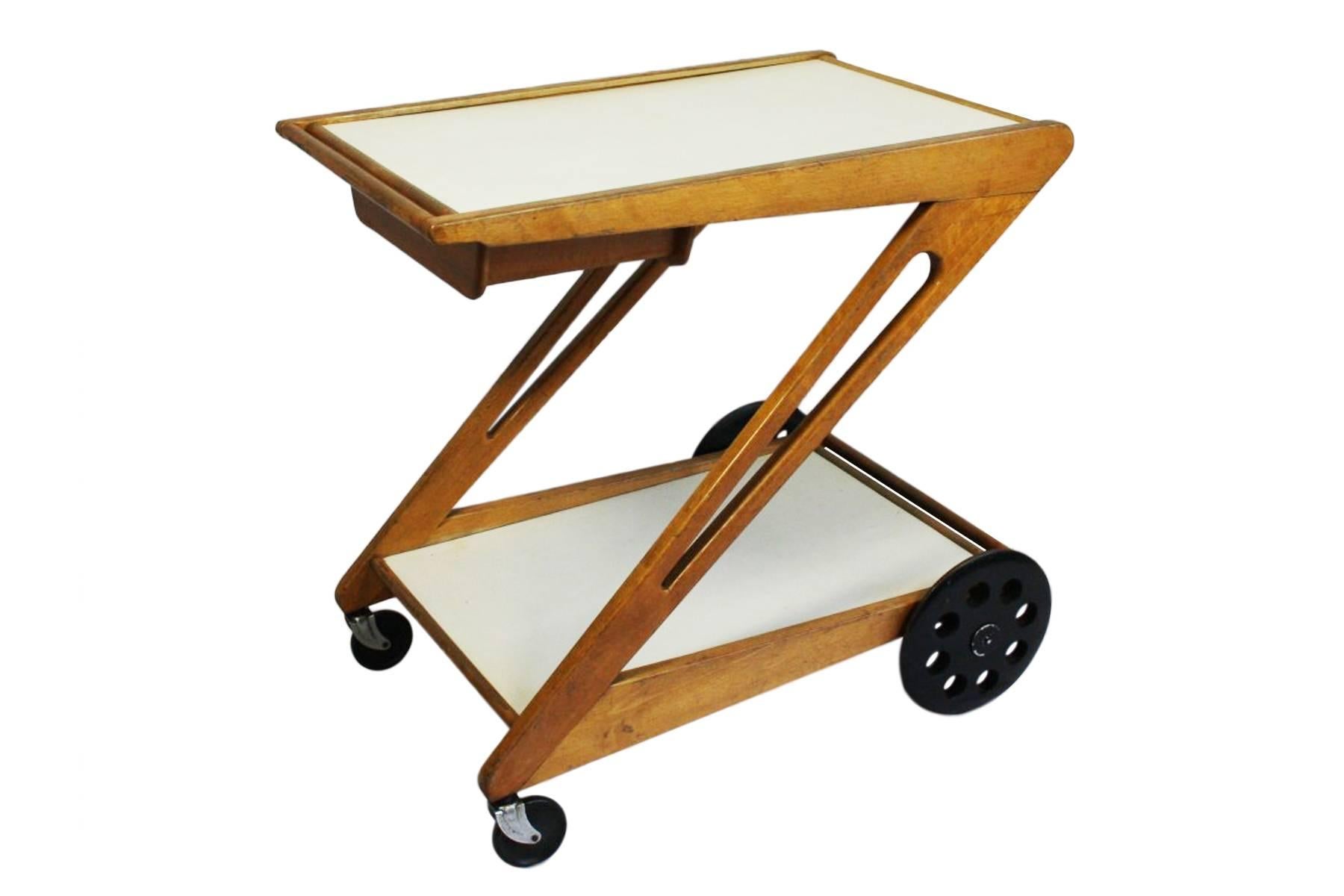 Rare Cees Braakman tea/drinks bar serving trolley for Pastoe. 

The cantilever form has a white pull out tray that reveals a bentwood draw - the top is a little tight when not in use but operates as it should. The trolley is in good vintage