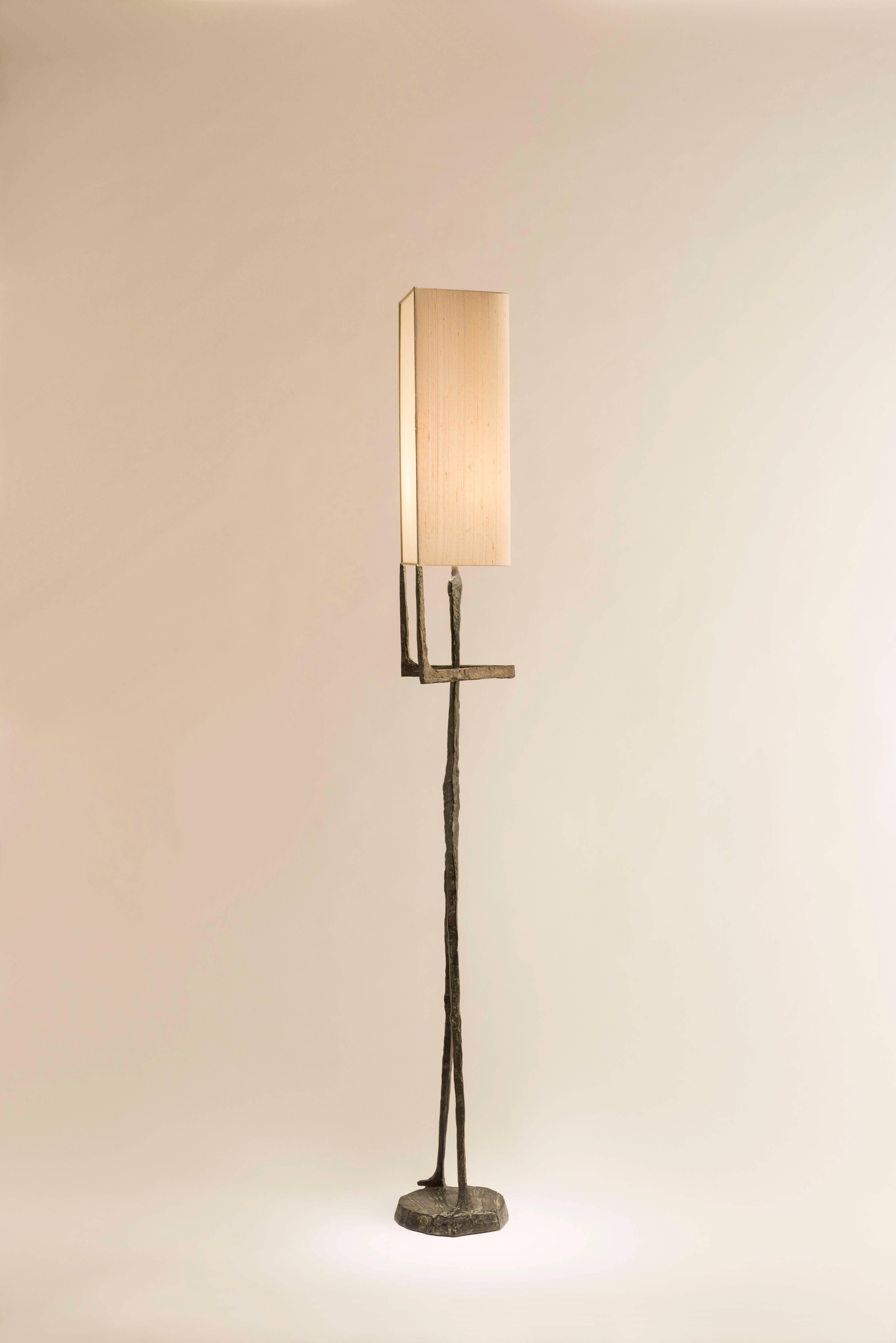 Echassier floor lamp, with a double fabric shade
Signed FELIX AGOSITINI and numbered
Manufactured by Charles Paris
Engraved 