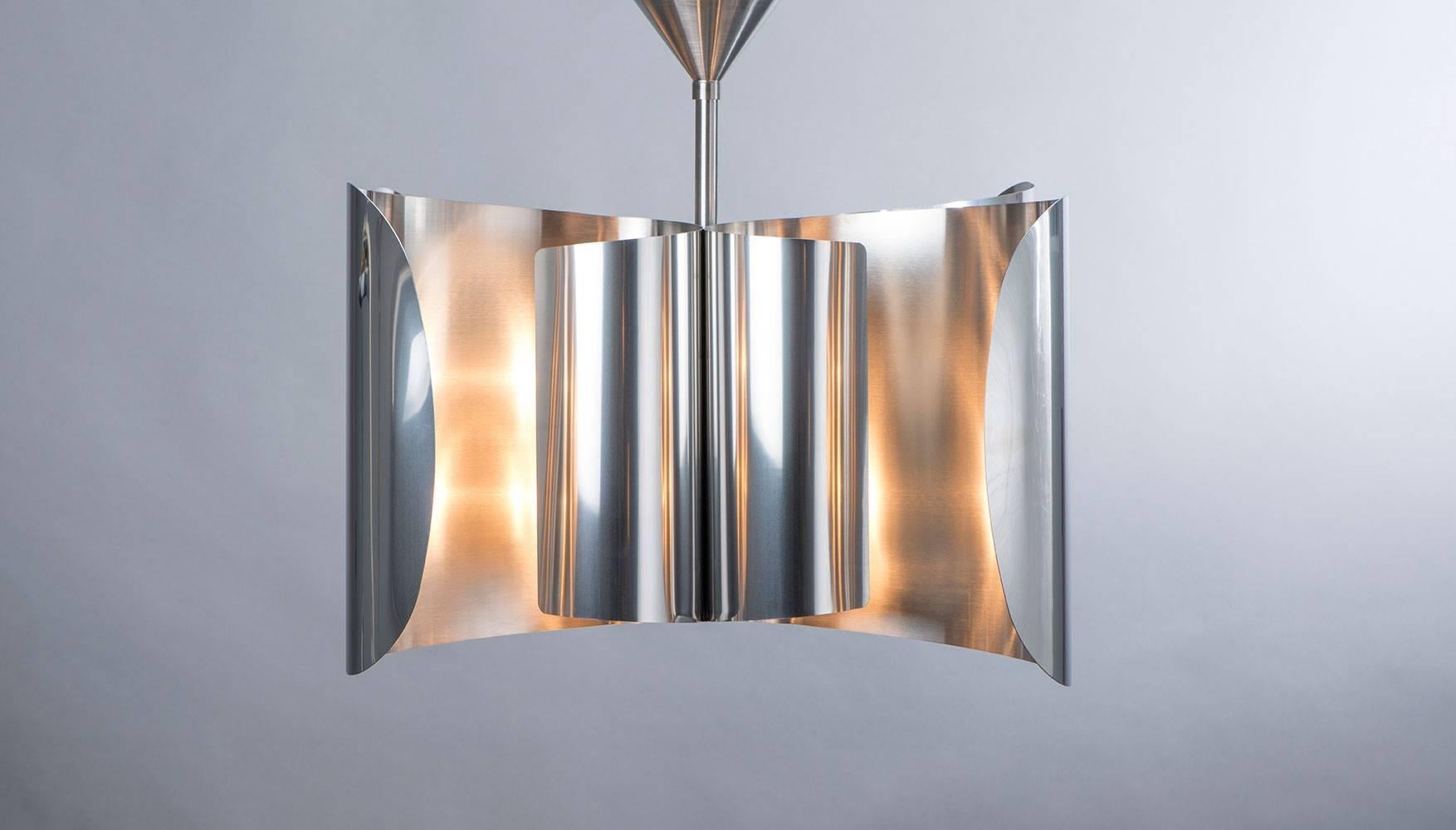 Voiles chandelier
Design Jacques Charles
Made of stainless steel
Made by Charles Paris.