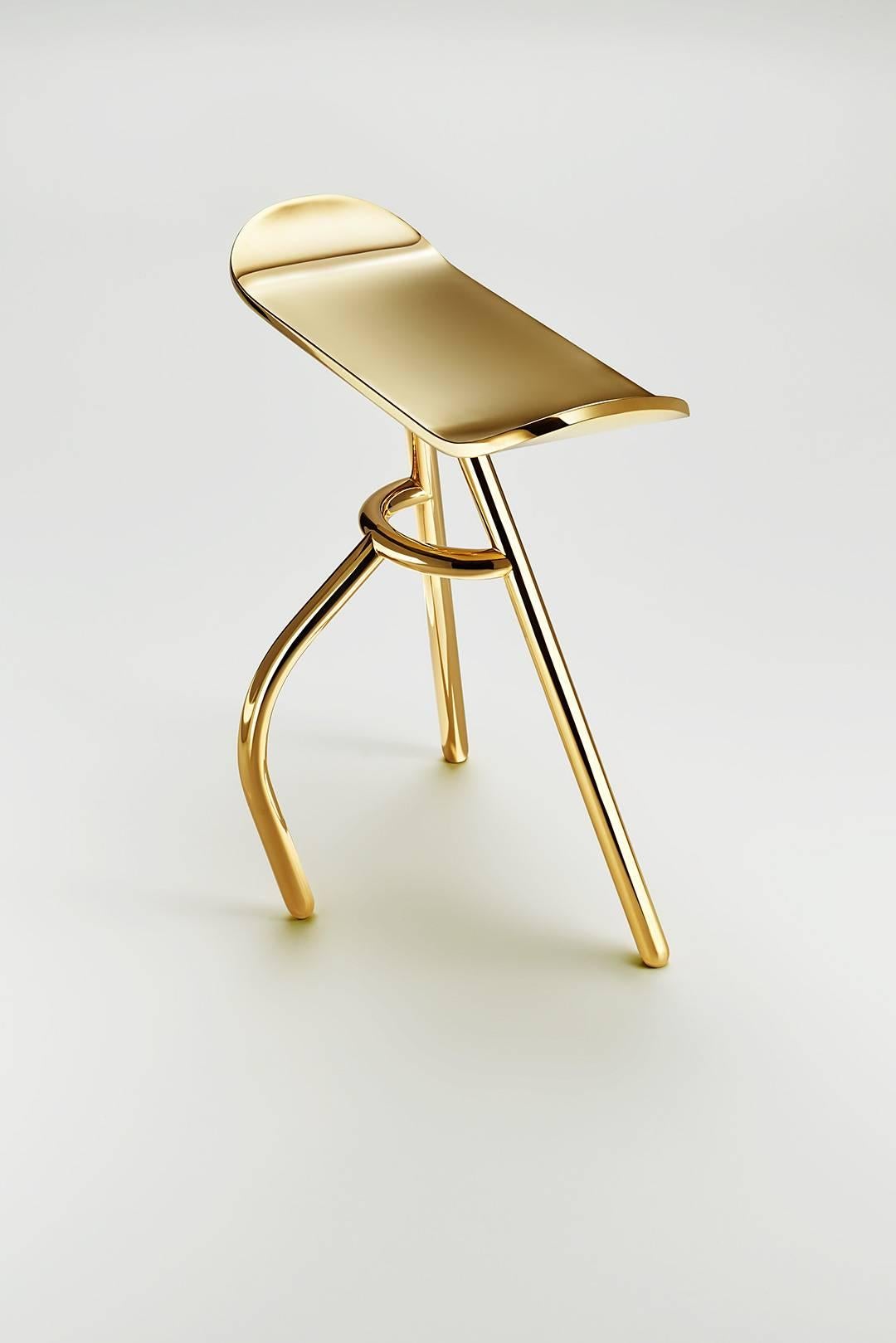 The stool is a standing stool made of brass designed by Kossi Aguessy, made in France, different finishes available.