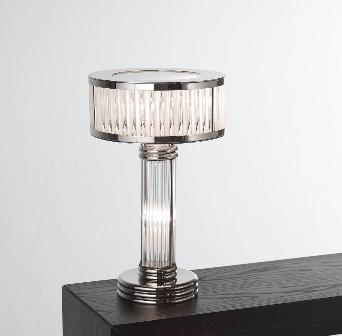 Art Deco table lamp with nickel finish and glass rods.
