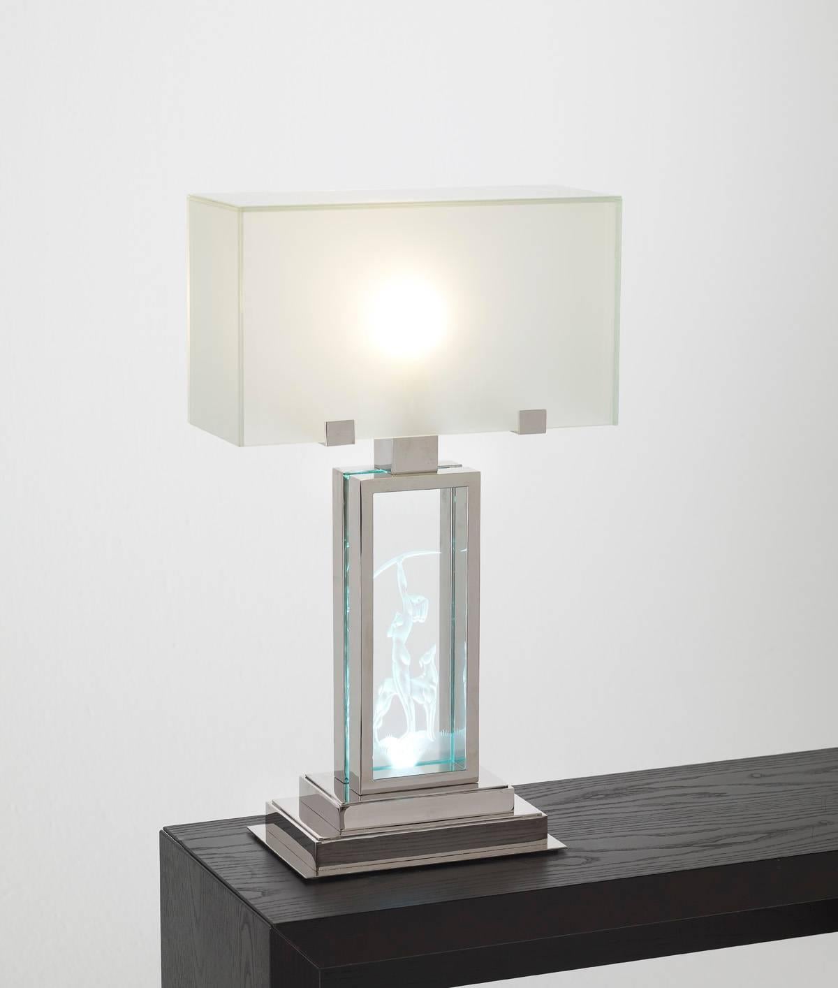 Table lamp with nickel finish and Diane glass.
