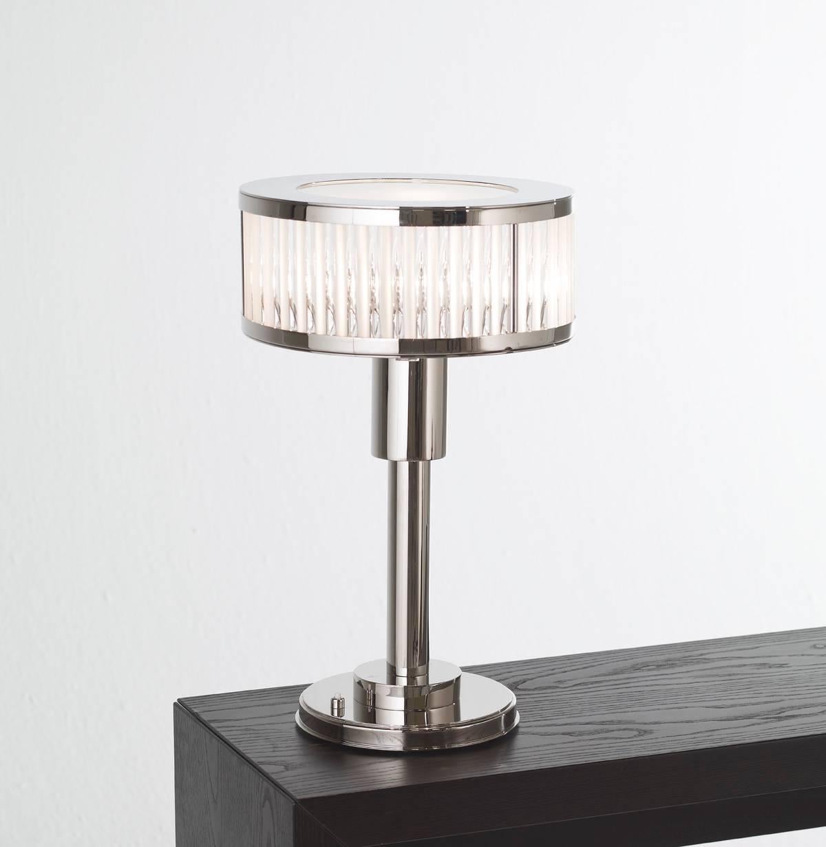 Art Deco table lamp with nickel finish and glass rods.