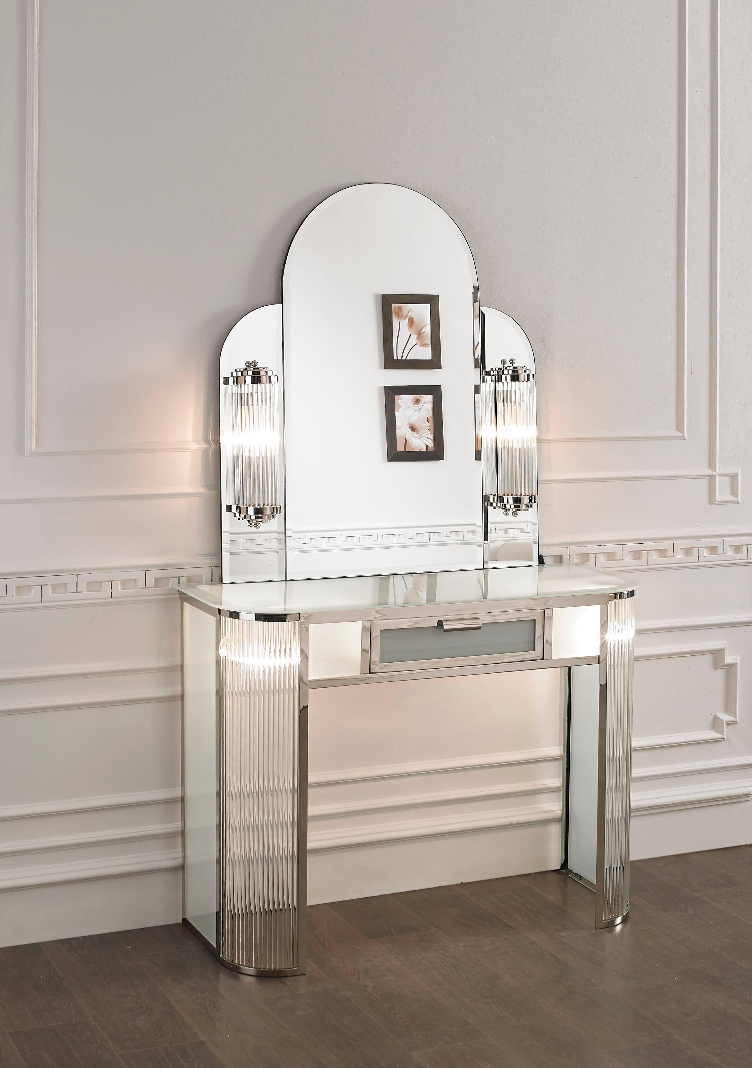 Art Deco dressing table with mirror and sconces.
