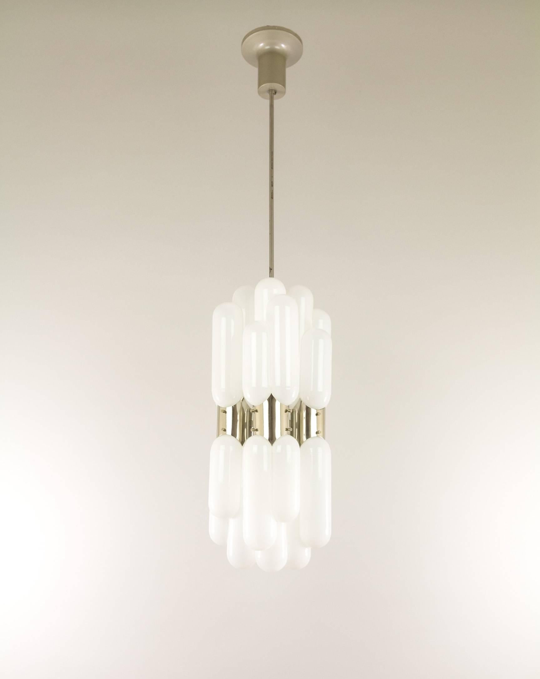 An extraordinary pendant designed by Carlo Nason and produced by AV Mazzega. The lamp is made of eight handblown opaline glass pieces, each consisting of three tubes in differing lengths.

Measure: Each double light fitting is 57 cm long. The