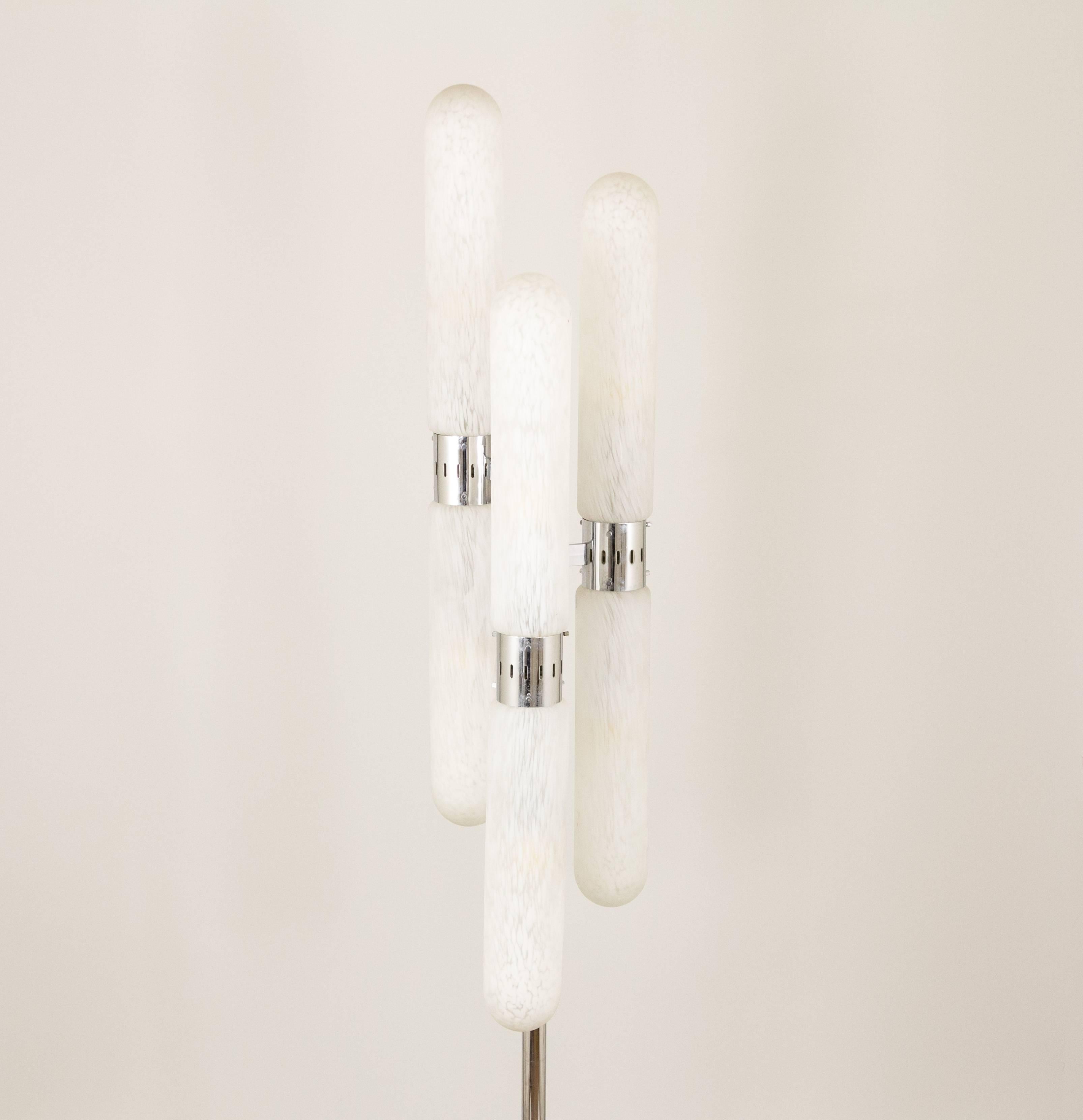 An exceptional floor lamp by Carlo Nason for renowned Murano glassmakers AV Mazzega.

The lamp consists of six handblown glass tubes, which are arranged at different heights. The glass varies from milk white to transparent which gives an extra