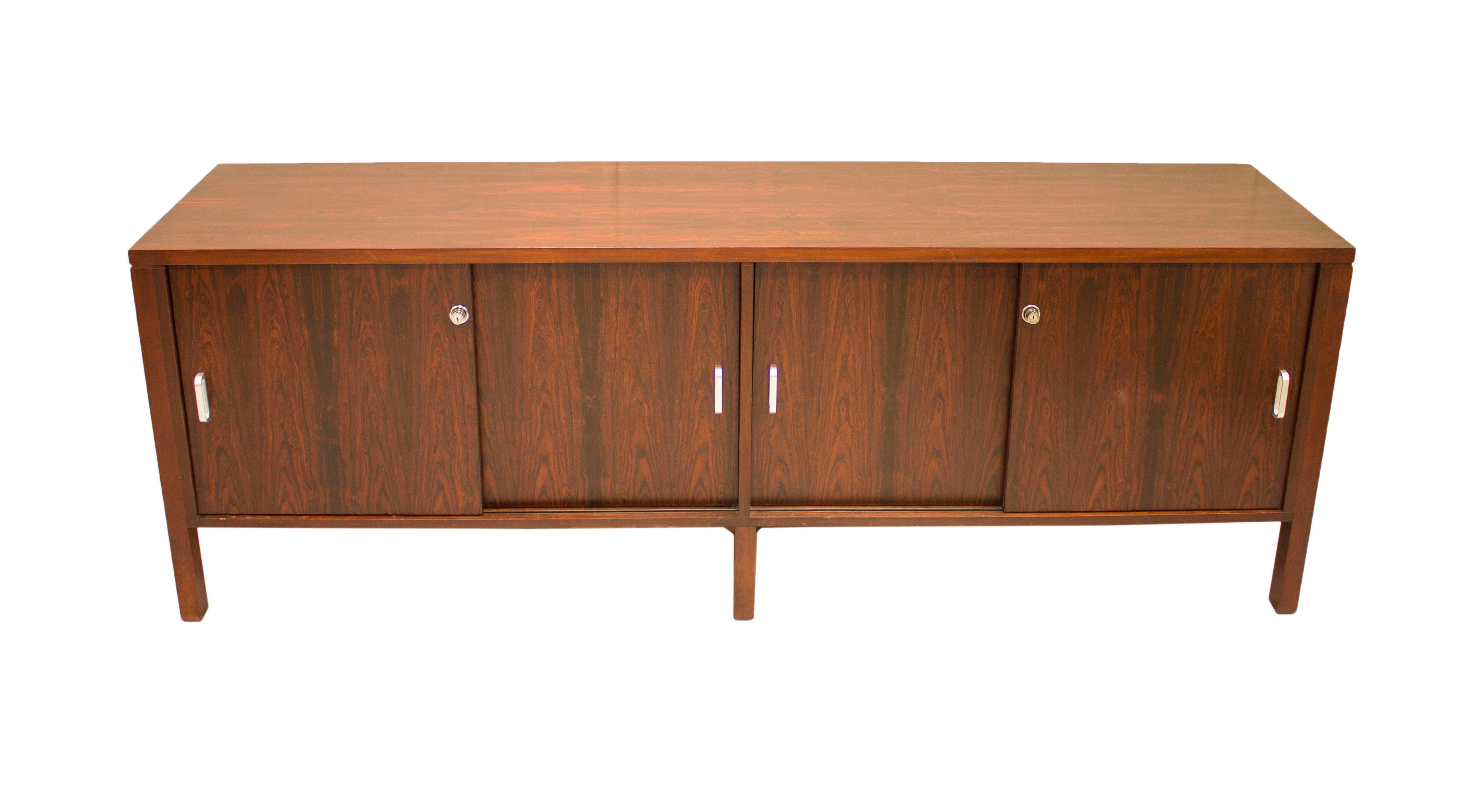 The Danish designers of the Mid-Century movement brought clean, simple lines to the masses and introduced the world to the wonders of Mahogany in its many guises, stunning grain and rich colors.

This stunning unit with its two large storage areas