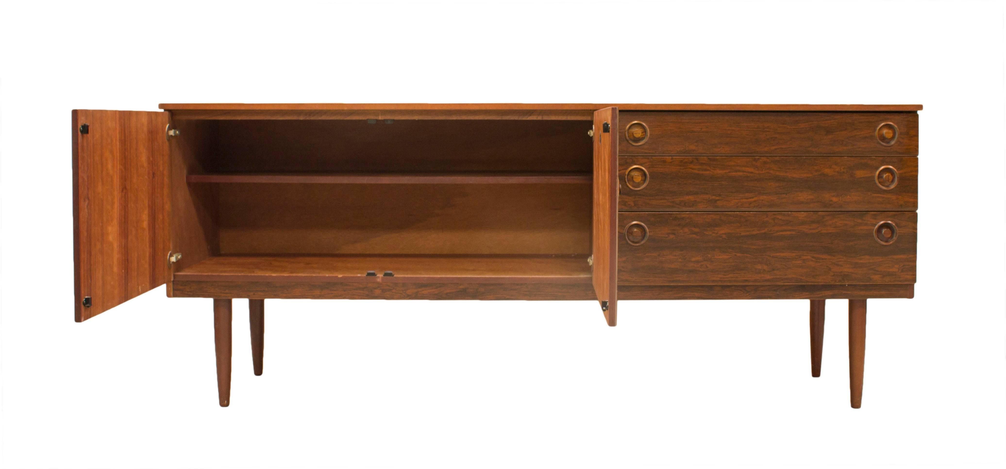 Greaves & Thomas are renowned for their innovative and stunning designs and this Mahogany sideboard with its intricate rosewood pulls is a wonderful example of how they brought exotic materials together to create stylish and highly practical