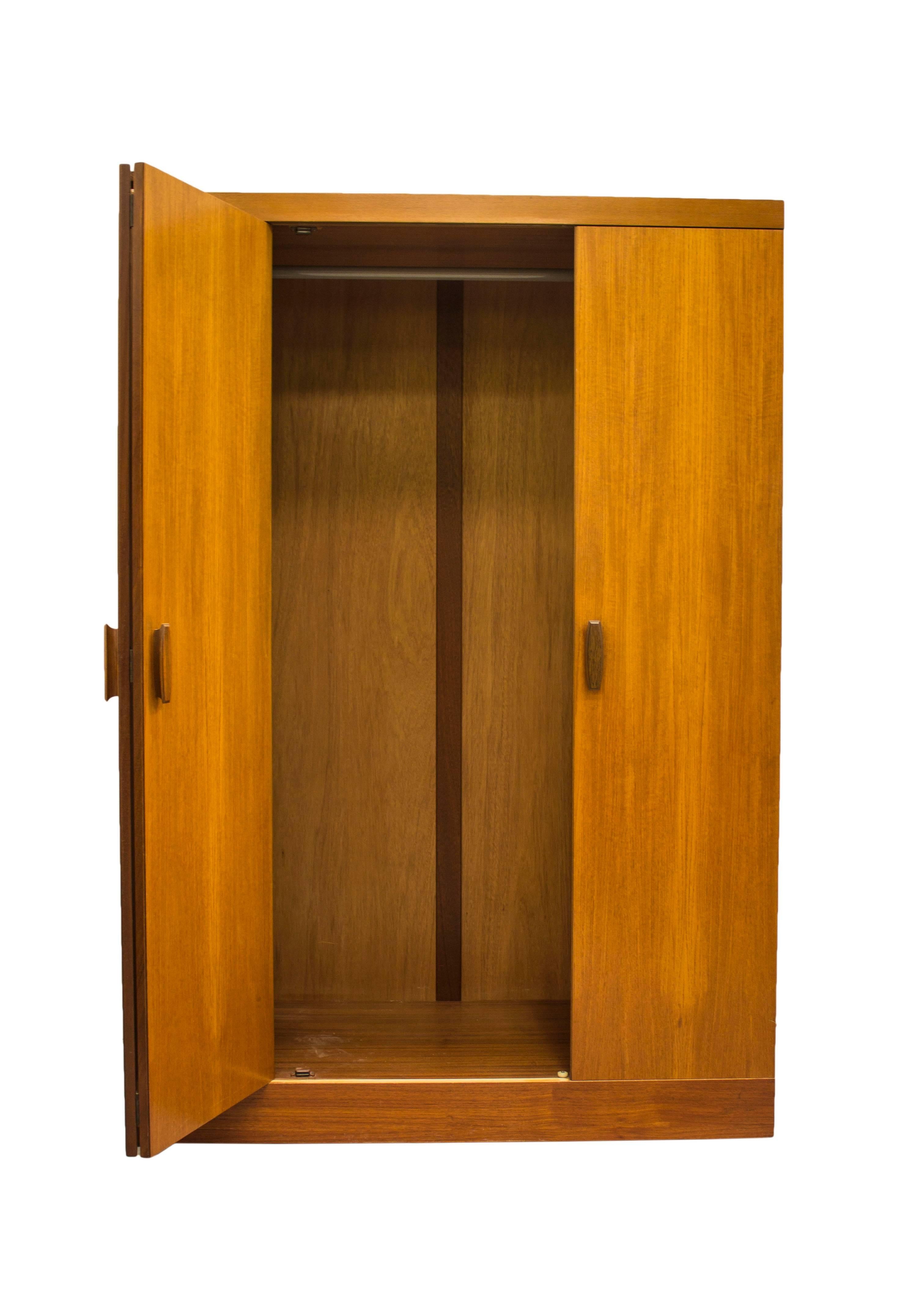 1965 could be argued as one of the best years for G Plan design with R Bennett creating the stunning Quadrille range of furniture in luxurious Teak with beautiful Rosewood handles.

This extremely spacious and highly practical wardrobe is a great