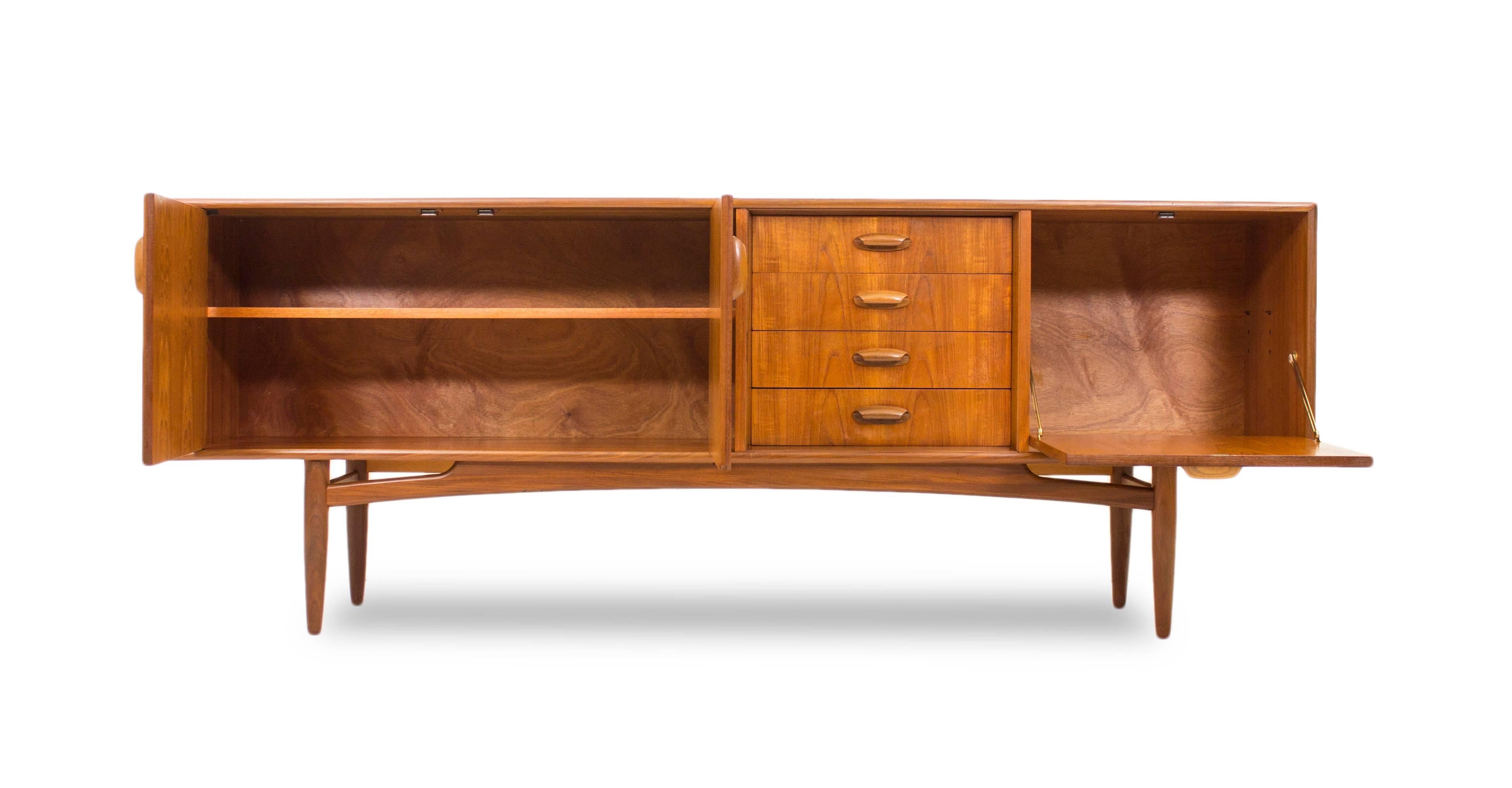 In 1964 G Plan upped their game and introduced their own range of Danish inspired designs with a unique and beautifully Scandinavian influence that was to take the world by storm!

This stunning sideboard was produced in a variety of models all