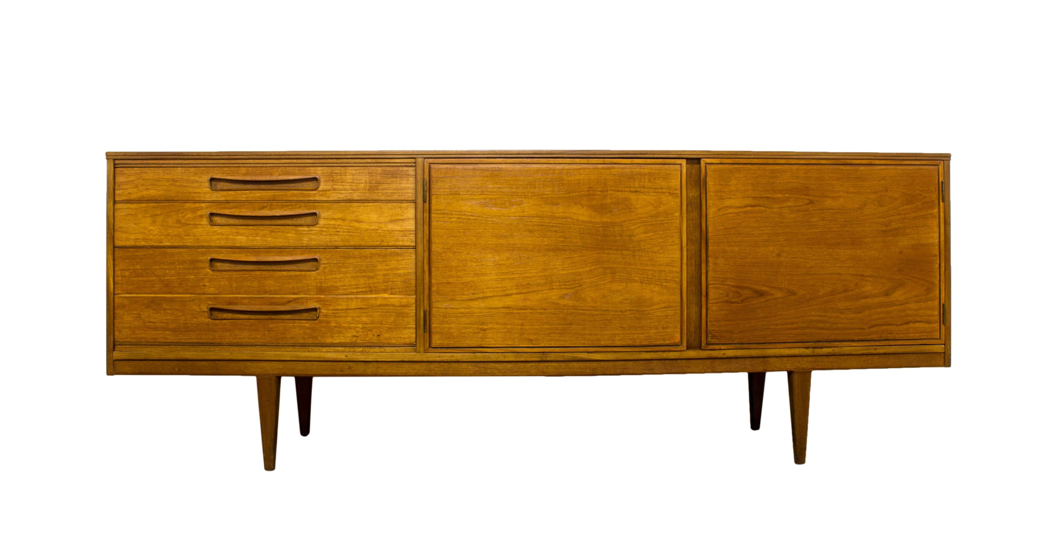 Founded in 1956, Alfred COX (Furniture) Ltd swiftly became a household name with their high quality and stylish designs sold exclusively through Heals of London. Using the most exquisite of woods in their furniture, Alfred COX established themselves