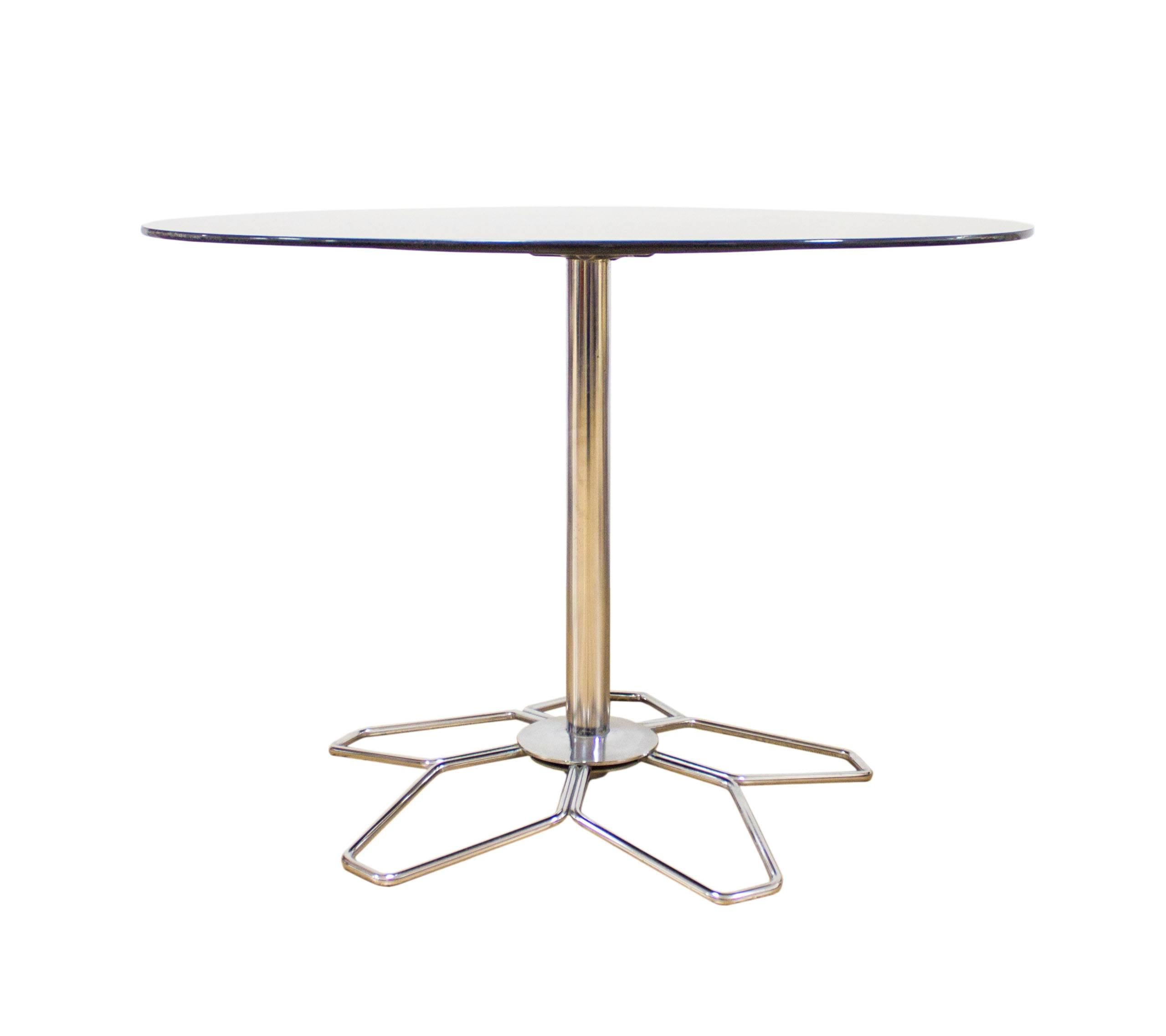 The Mid-Century era was an age of discovery amongst furniture makers, taking new and exciting materials and using them to create amazing new styles.
Glass featured heavily in this new age of design and this stunning heavy and thick smoked glass and