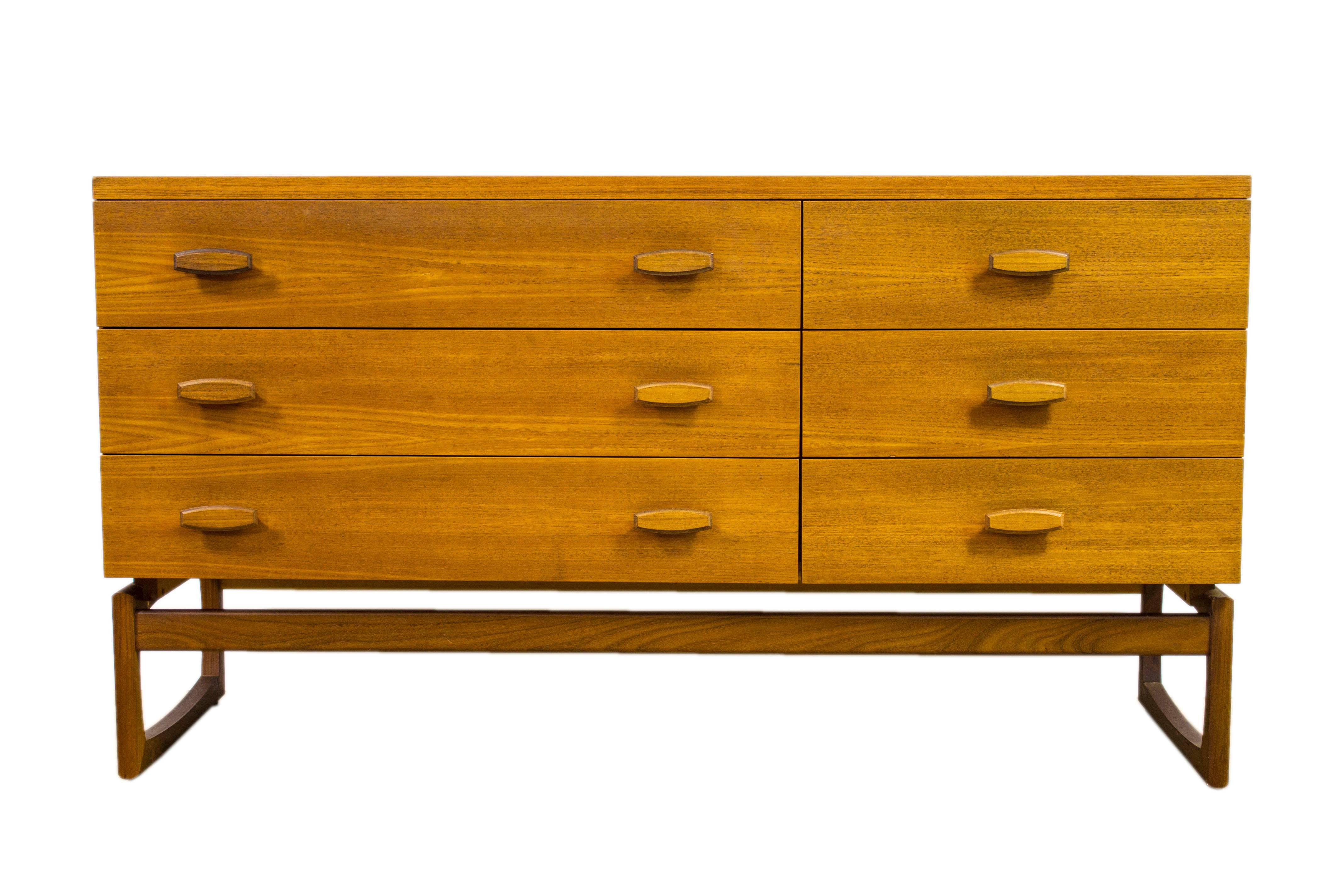 1965 could be argued as one of the best years for G Plan design with R Bennett creating the stunning Quadrille range of furniture in luxurious teak with beautiful geometric styled handles.

An elegant and striking design, this rare sideboard
