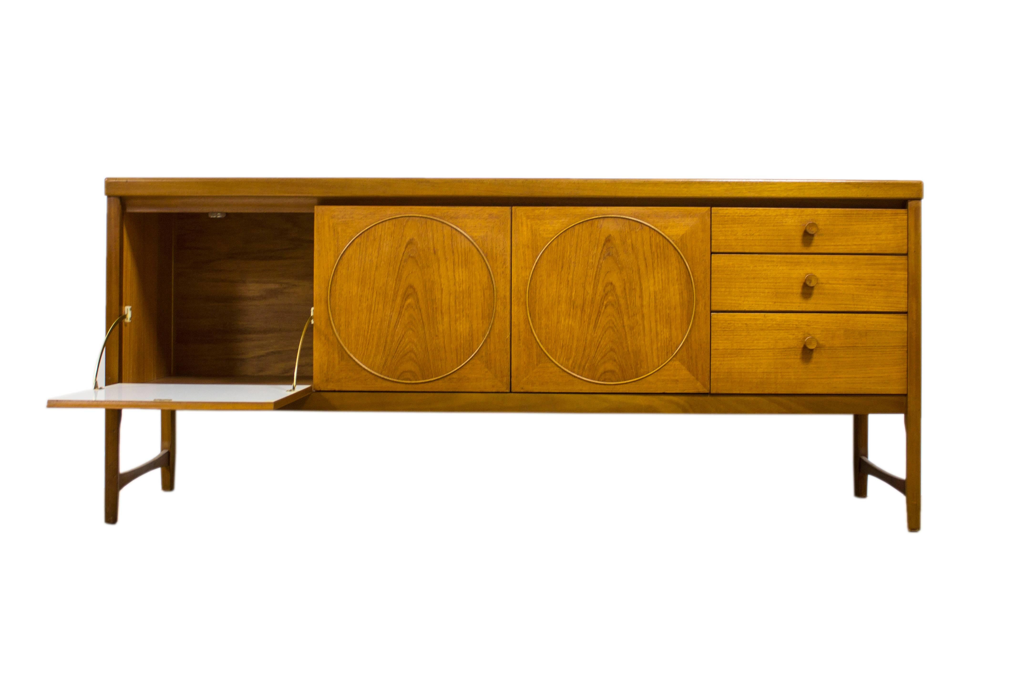 Nathan furniture have always had an eye for design and style and from a very early stage, they made themselves one of the market leaders for stylish and practical furniture.

This stunning Nathan “Circles” teak sideboard is a great storage piece