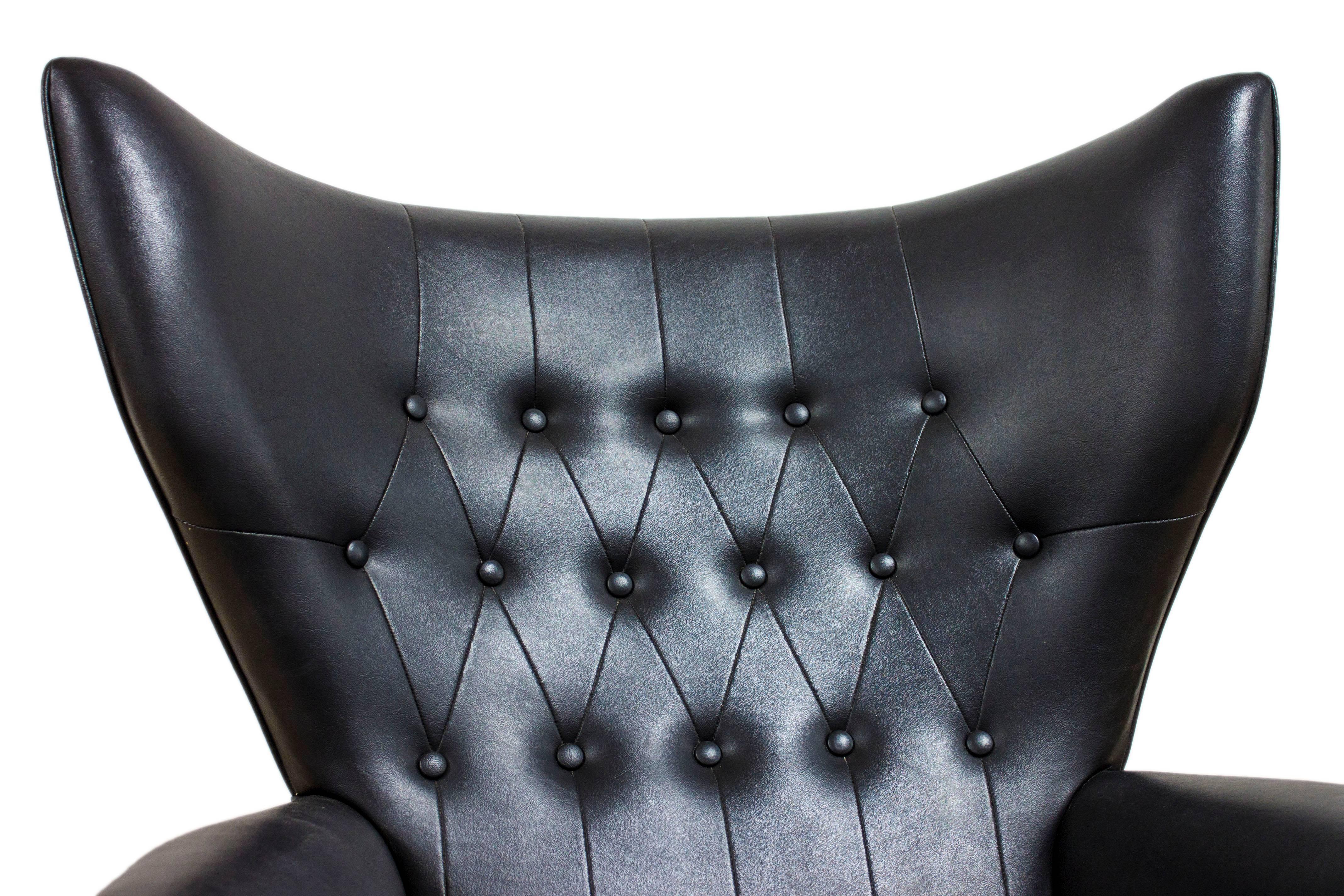 British G Plan Wingbacked Blofeld Swivel Chair Model 6250 Black Leather Eames Era For Sale