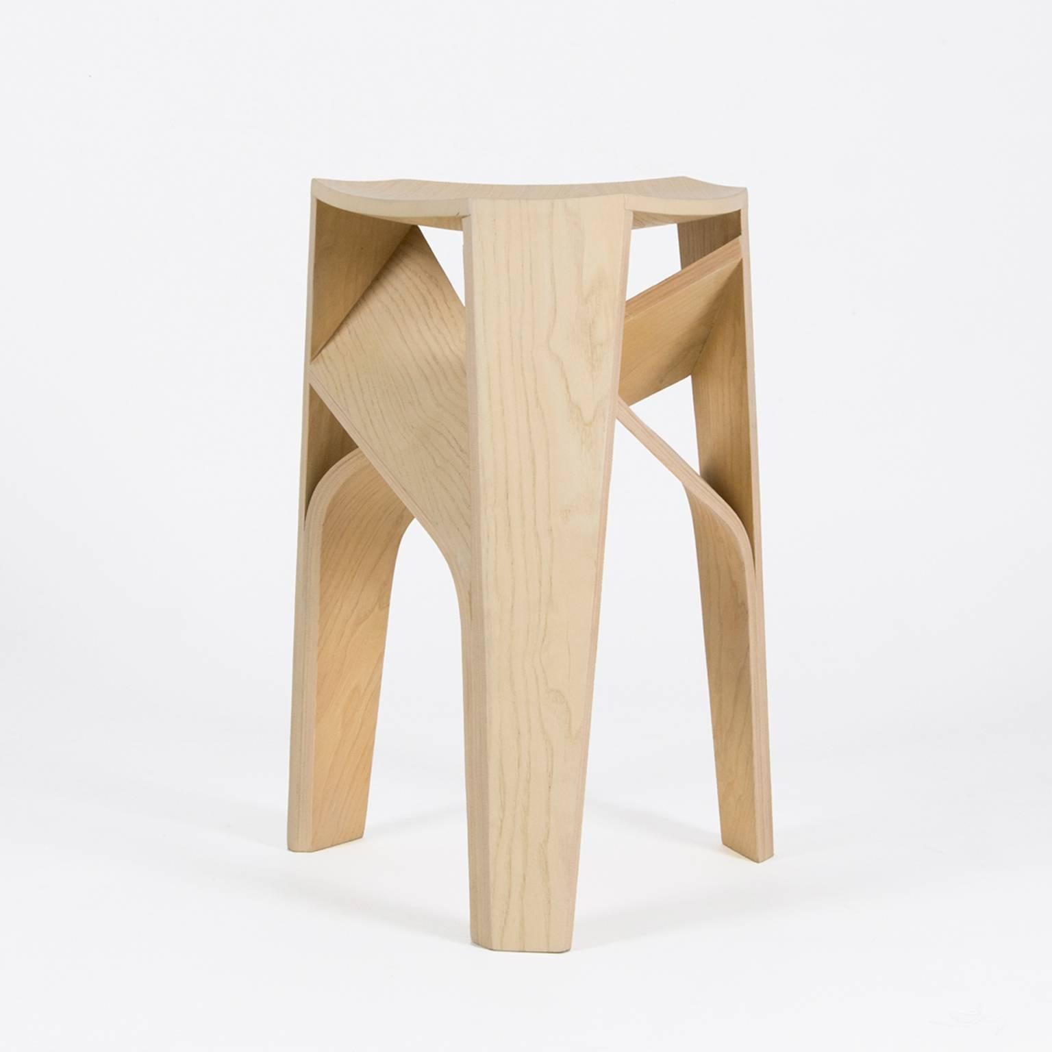 three legged wooden stool