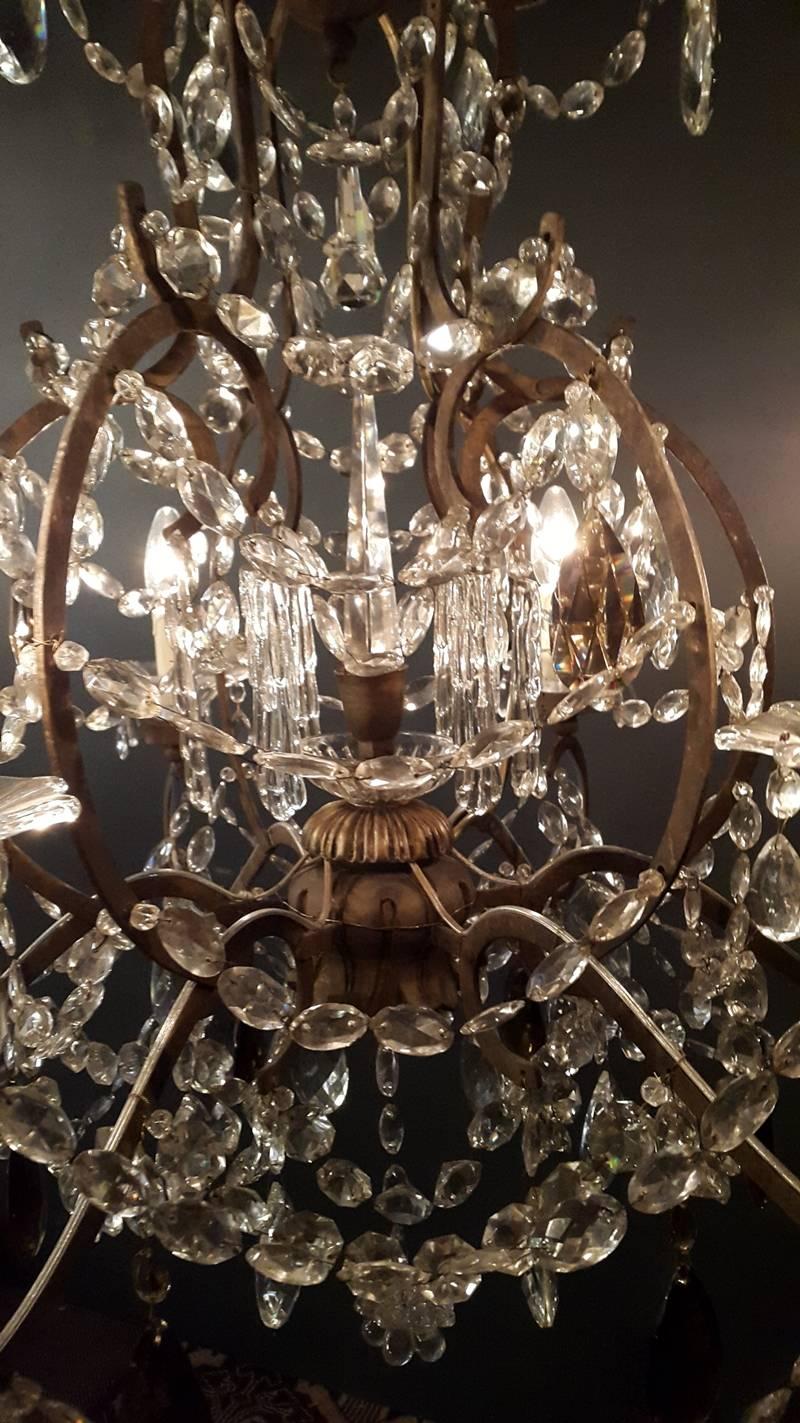 Original preserved chandelier, circa 1900. Cabling and sockets completely renewed. Crystal hand-knotted
Total height: 99cm height without chain: 80cm diameter: 70cm weight (approximately): 13kg

Number of lights: Six light bulb sockets: E14.

 