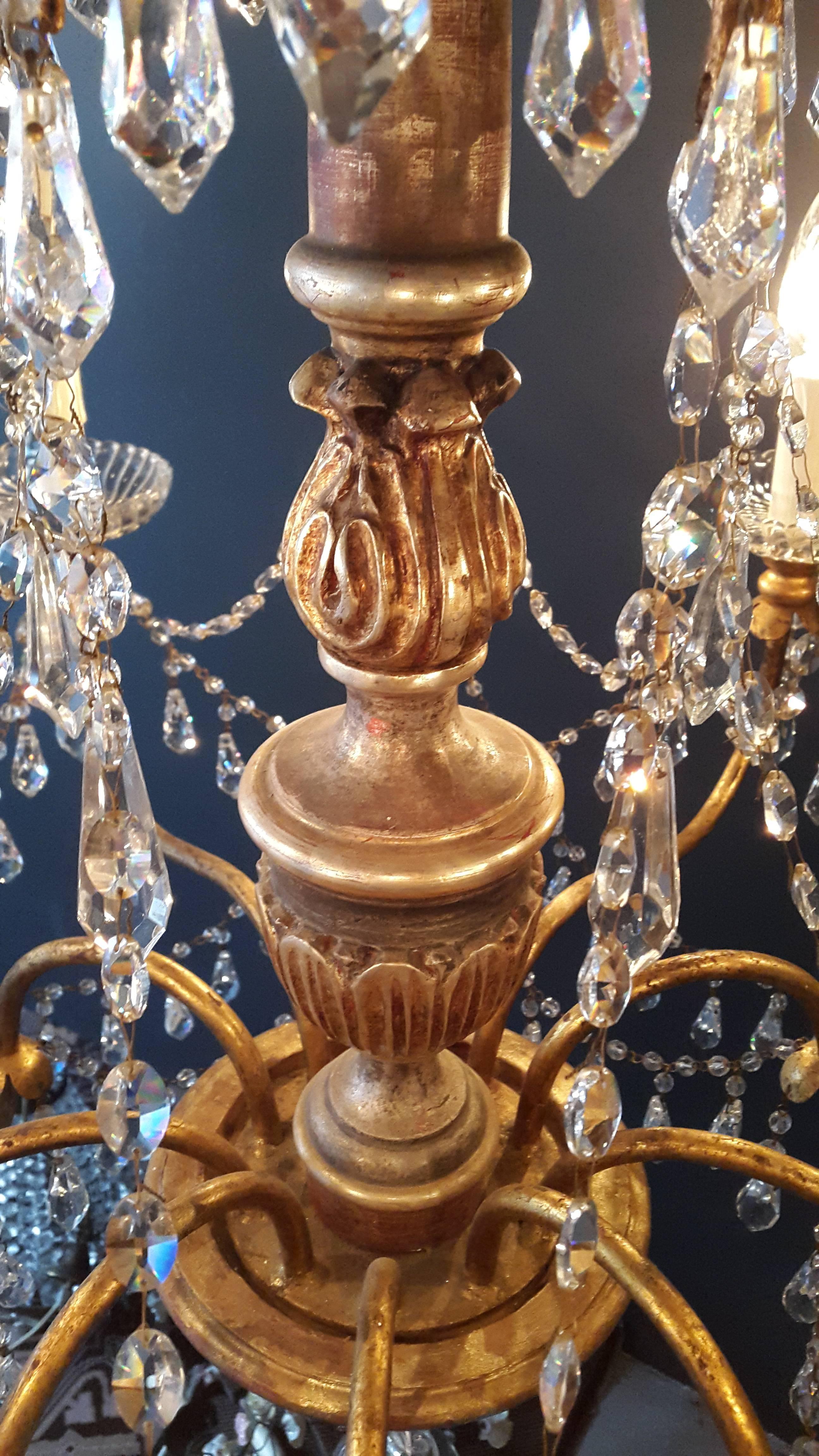 Original preserved chandelier, circa 1900. Cabling and sockets completely renewed. Crystal hand-knotted
Measure: Total height 120cm, height without chain 90cm, diameter 70cm, weight (approximately) 10kg

Number of lights: Ten Light bulb sockets: