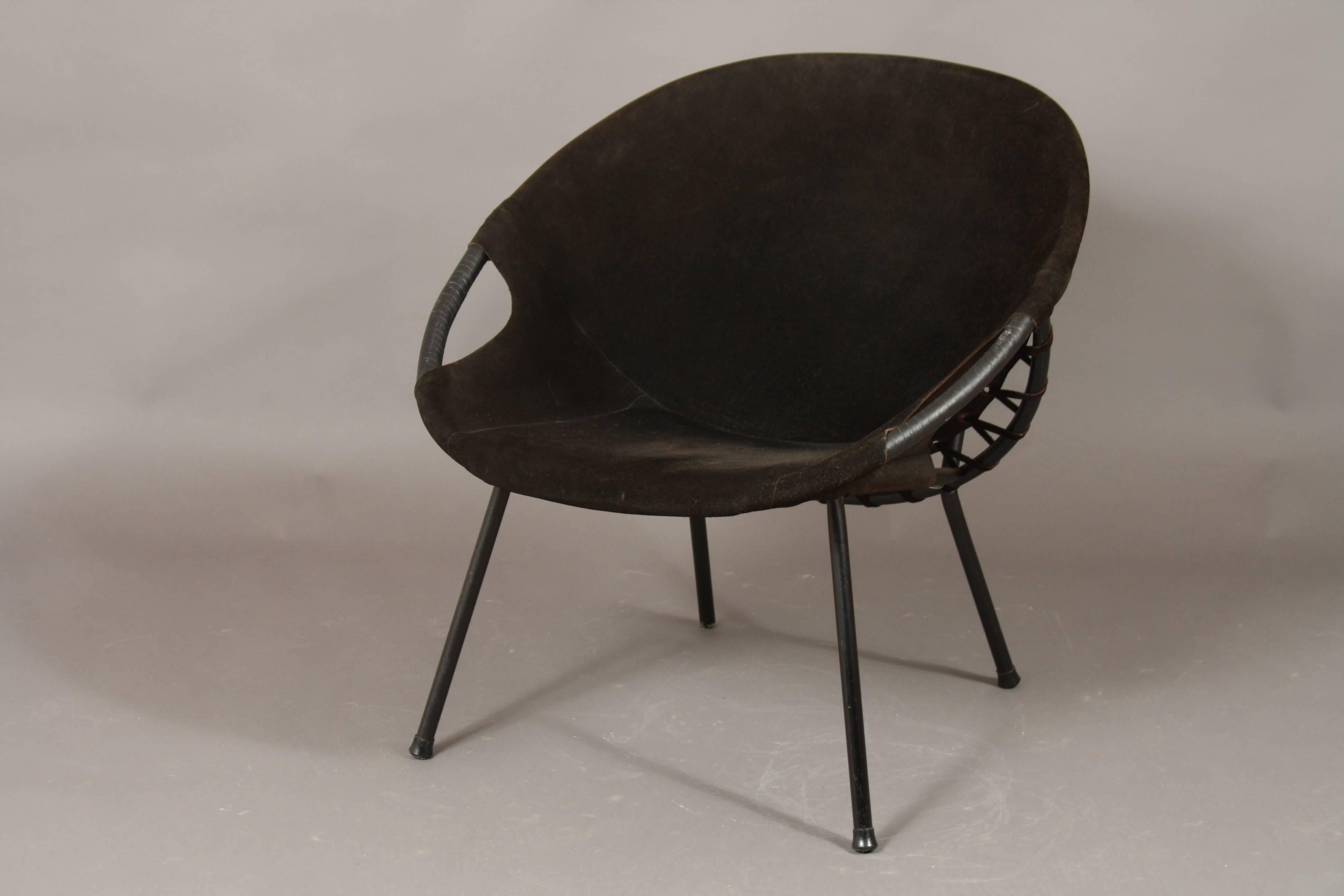 Pair of circle armchairs by Lusch Erzeugnis designed for Lusch Co. The armchairs were produced in the 1960s. The frame is black metal and the seat in very dark almost black suede. One of them is slightly lighter because of use.