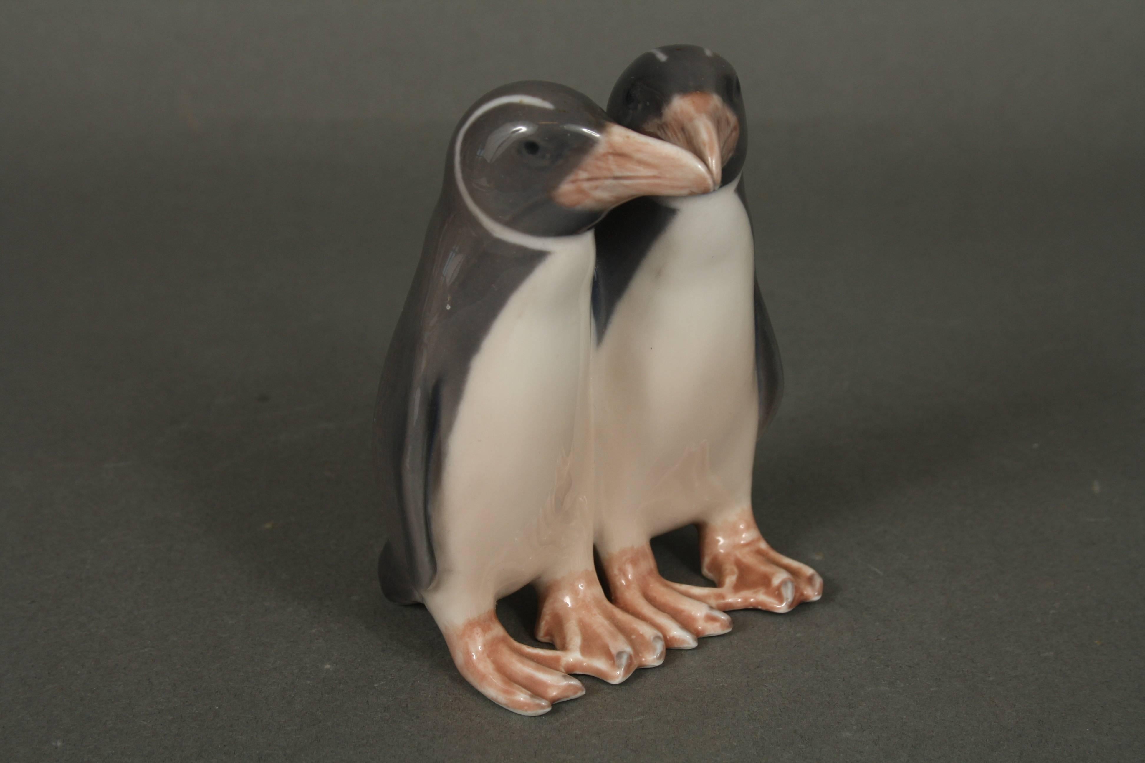 Royal Copenhagen, a pair of penguins, no. 1190, Anna Trap, Denmark. It has a little chip on the inner side of the beak, but it is not conspicuous, see the pictures.