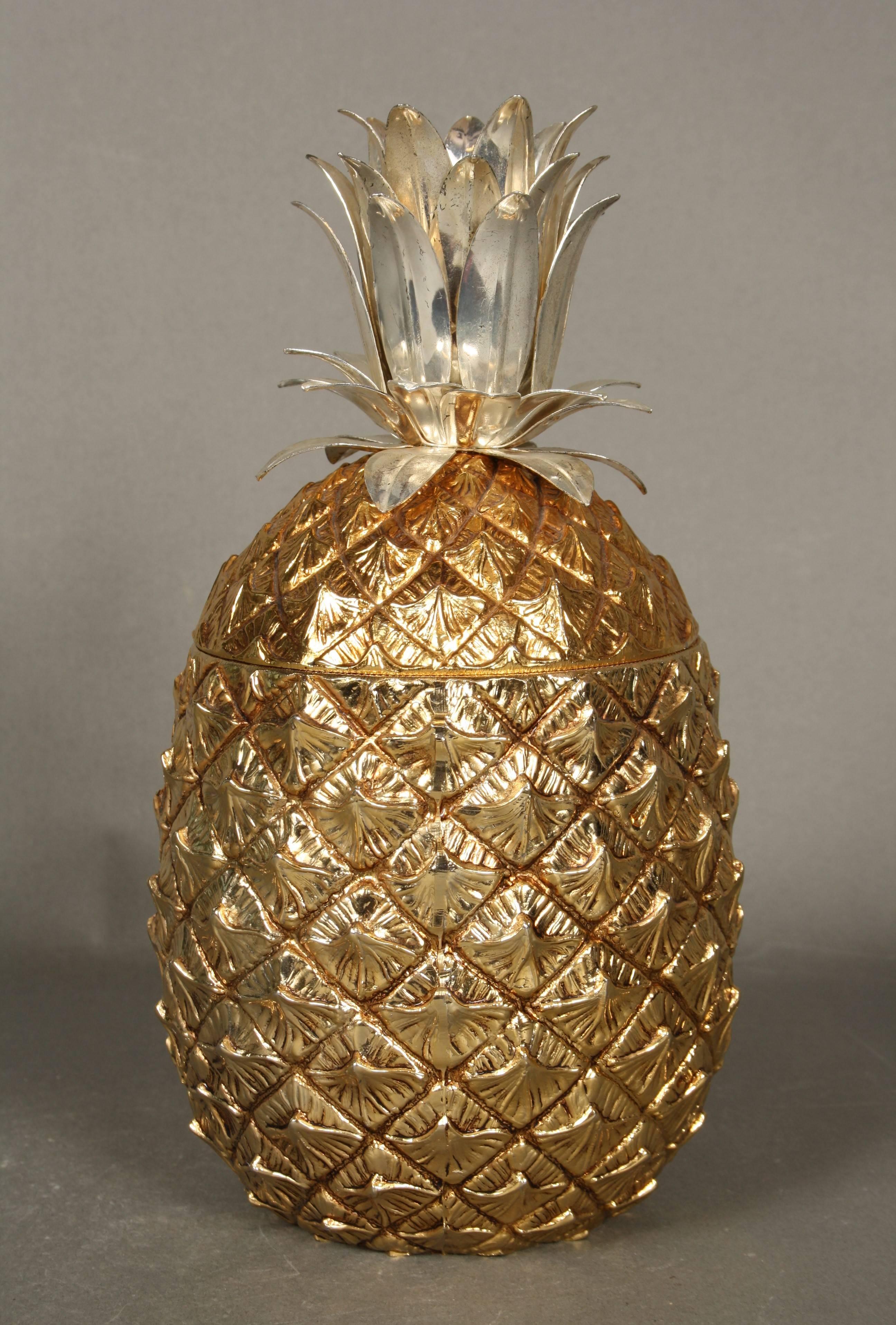 Awesome gilt colored with top silver colored, 1960s, Mauro Manetti pineapple shaped ice bucket.
Signed on base MM, Firenze, made in Italy.