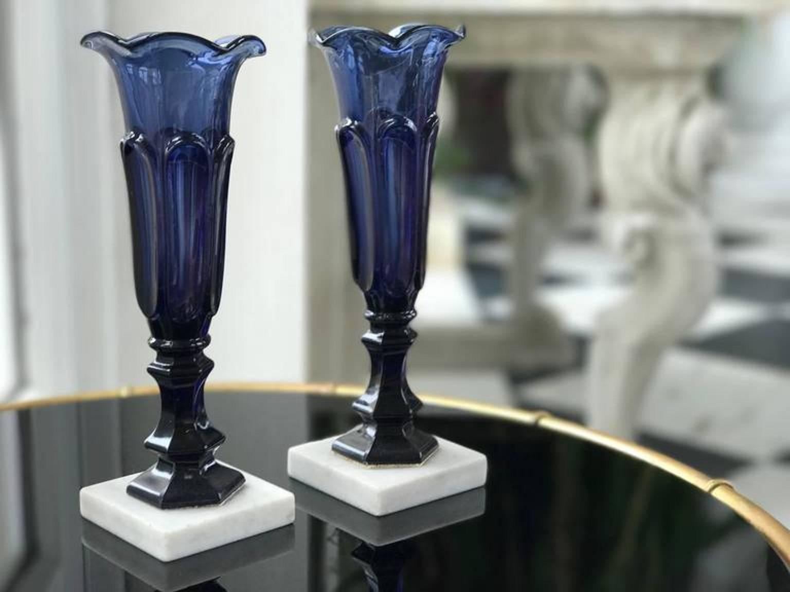 This electric blue pair of Boston sandwich glass vases is beyond stunning. These sandwich glass vases are in remarkable good condition for their age and are in the exceedingly rare electric blue color.
Made in MA by the Boston Sandwich Glass