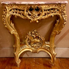 Console française ancienne de style Louis XV en bois sculpté doré et marbre, vers 1890.