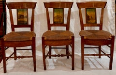 Set of 8 Antique French Provincial Fruitwood Chairs with Rush Seats, Circa 1900.
