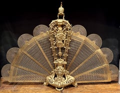 Eccezionale paravento araldico antico francese in bronzo dorato, risalente al periodo 1820-1850 circa.