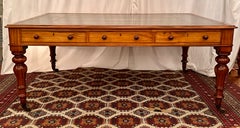 Antique English Walnut Partners Table Desk with Leather Top & Casters Circa 1880
