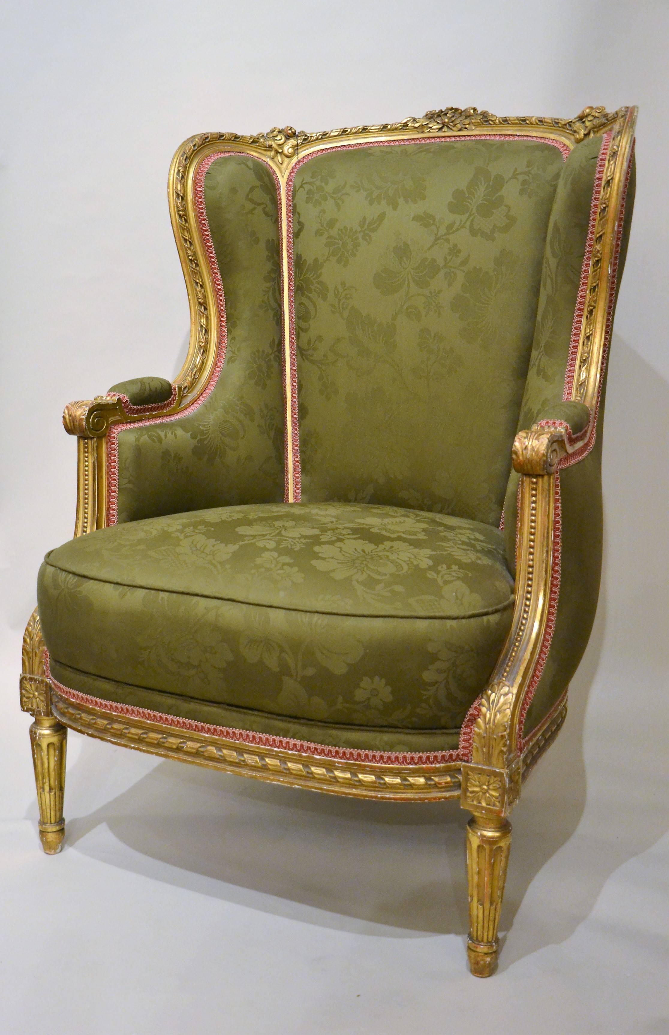 Antique French gold bergère in the style of Louis XVI, circa 1875-1895.