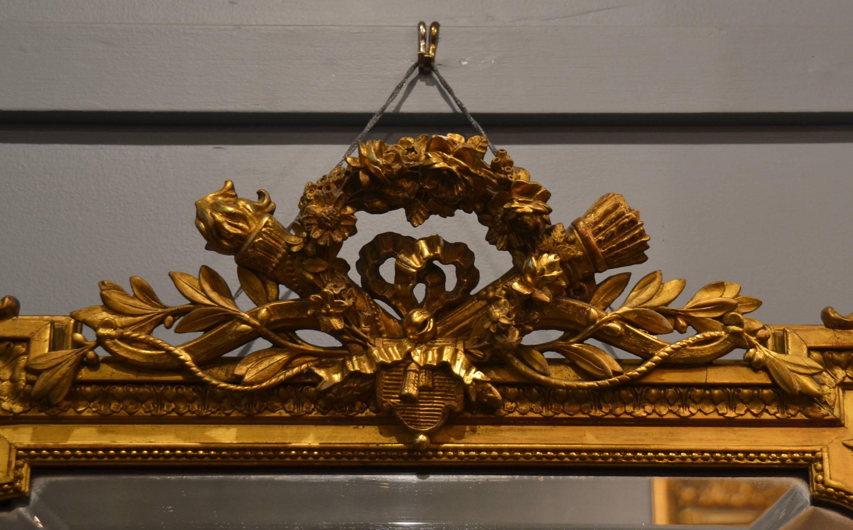 Antique gold leaf bevelled mirror, circa 1855-1865.