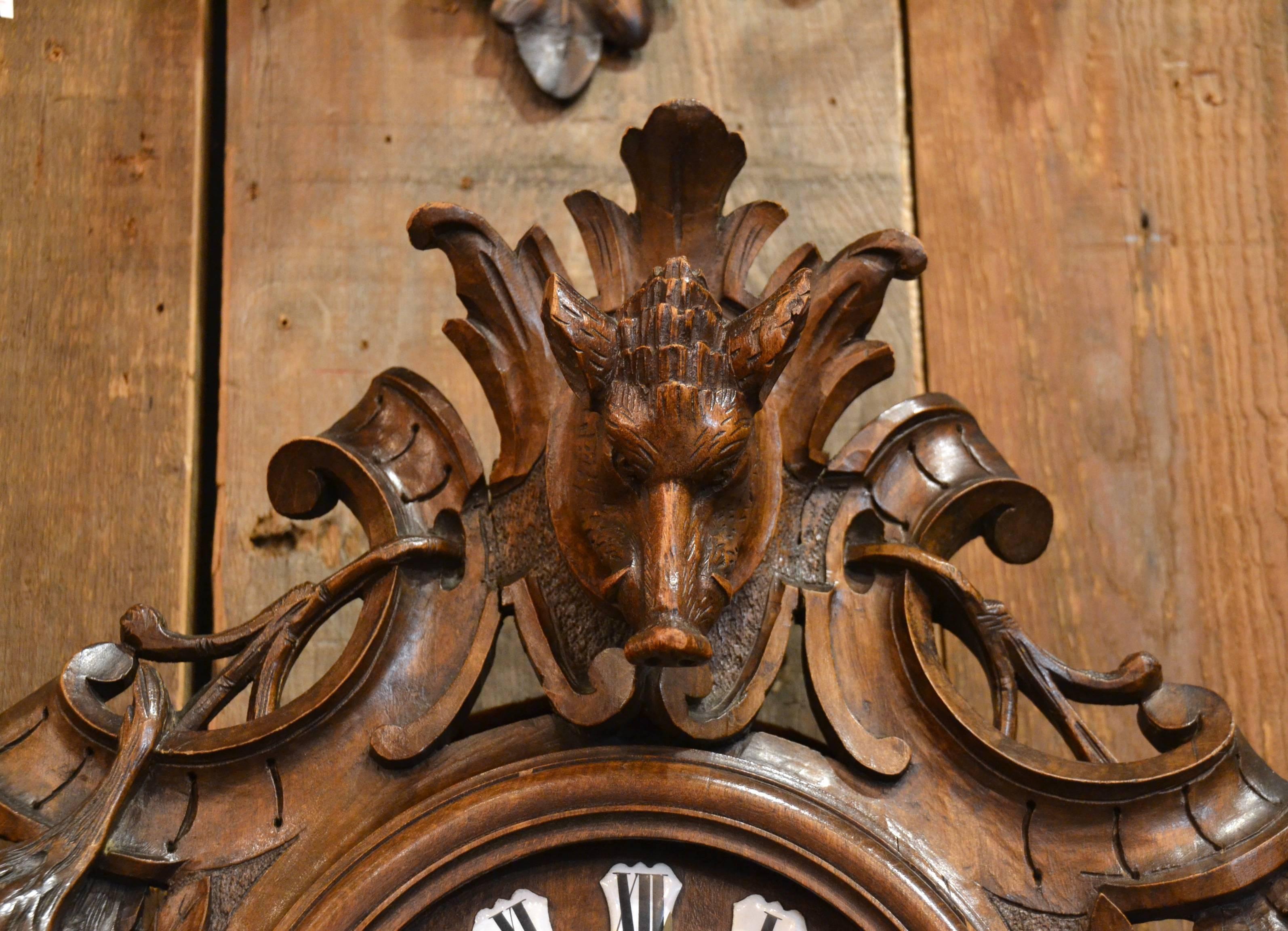 Antique carved walnut Provincial clock.