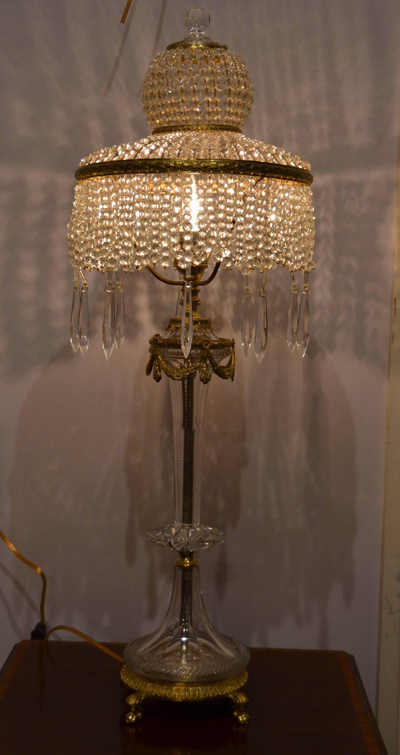 Pair of antique French crystal and bronze lamps, circa 1920.