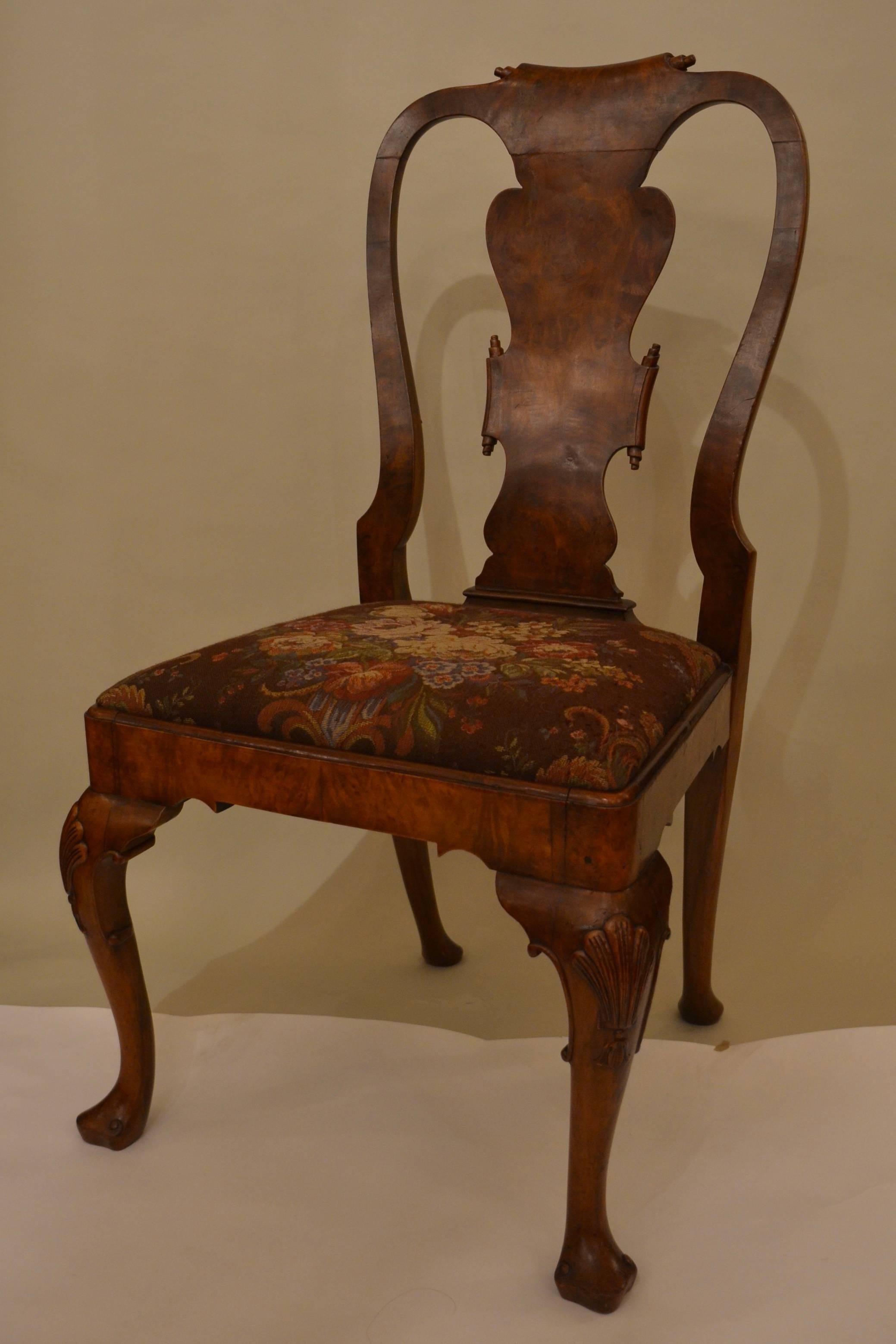 Set of four 19th century antique Queen Anne walnut side chairs.