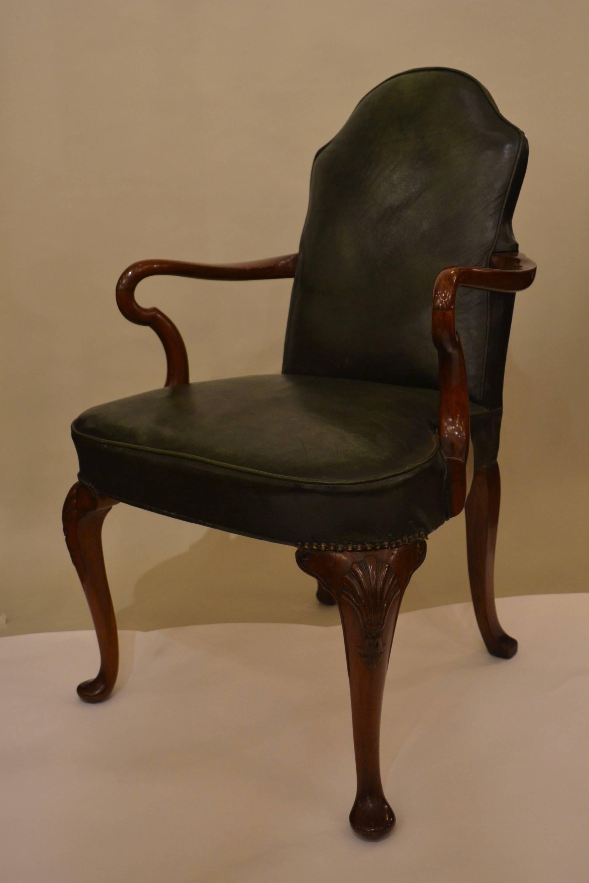 Pair of antique leather English armchairs, circa 1910-1920.