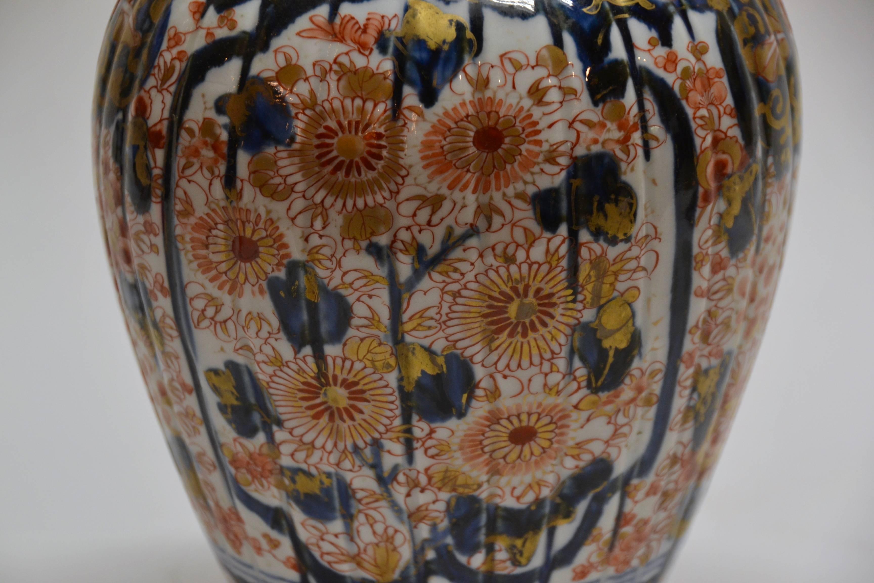 Mid-19th Century Pair of Antique Imari Vases and Covers