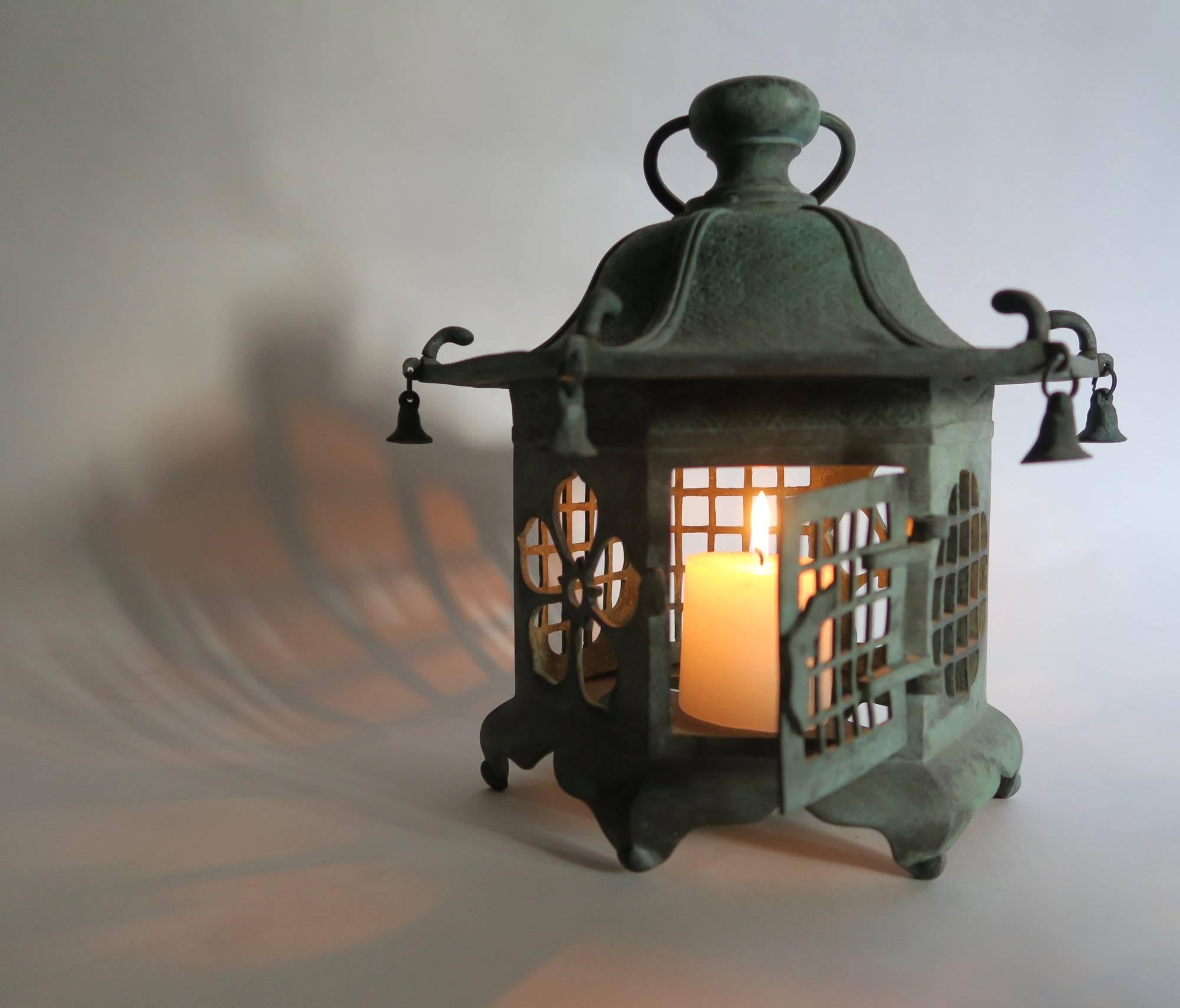 Heavy bronze hexagonal pagoda lantern with beautiful patinated verdigris finish
Japan, circa 1920
Weight 5 Kg
Looks great inside a home interior as well as placed outside on a terrace or in a garden
Has a suspension buckle and hole for