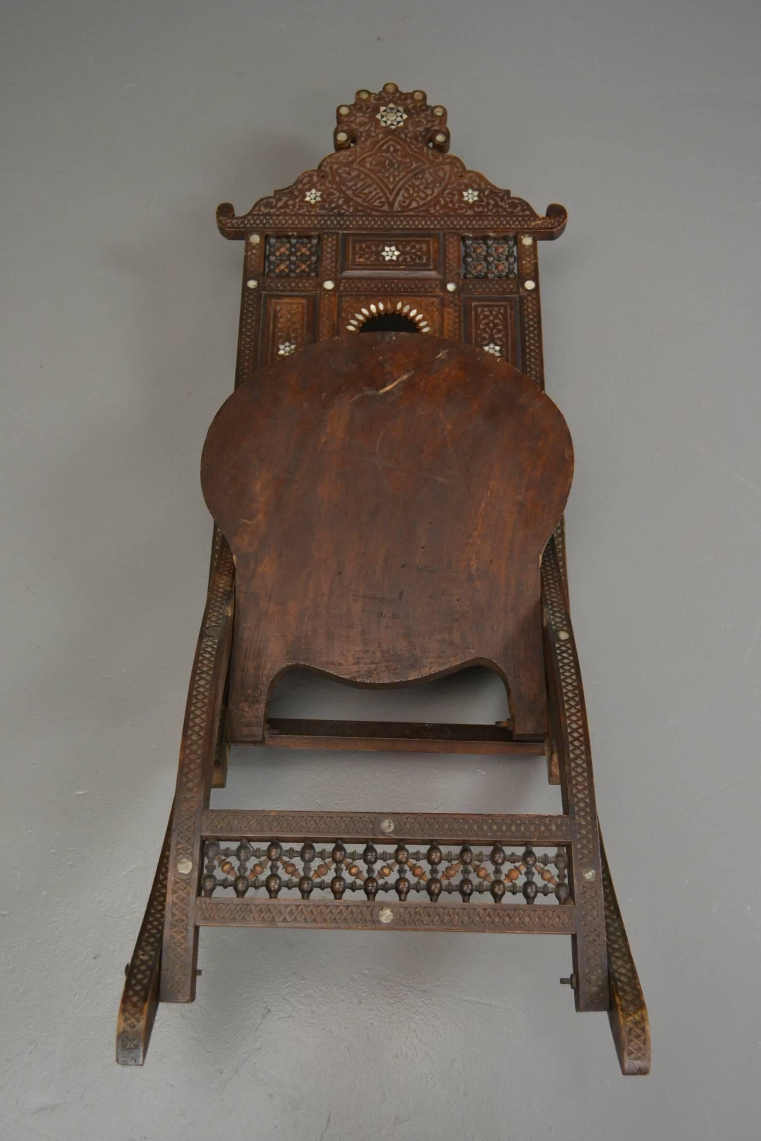 Early 20th Century Moorish Carved Teak and Inlaid Rocking Chair For Sale 5
