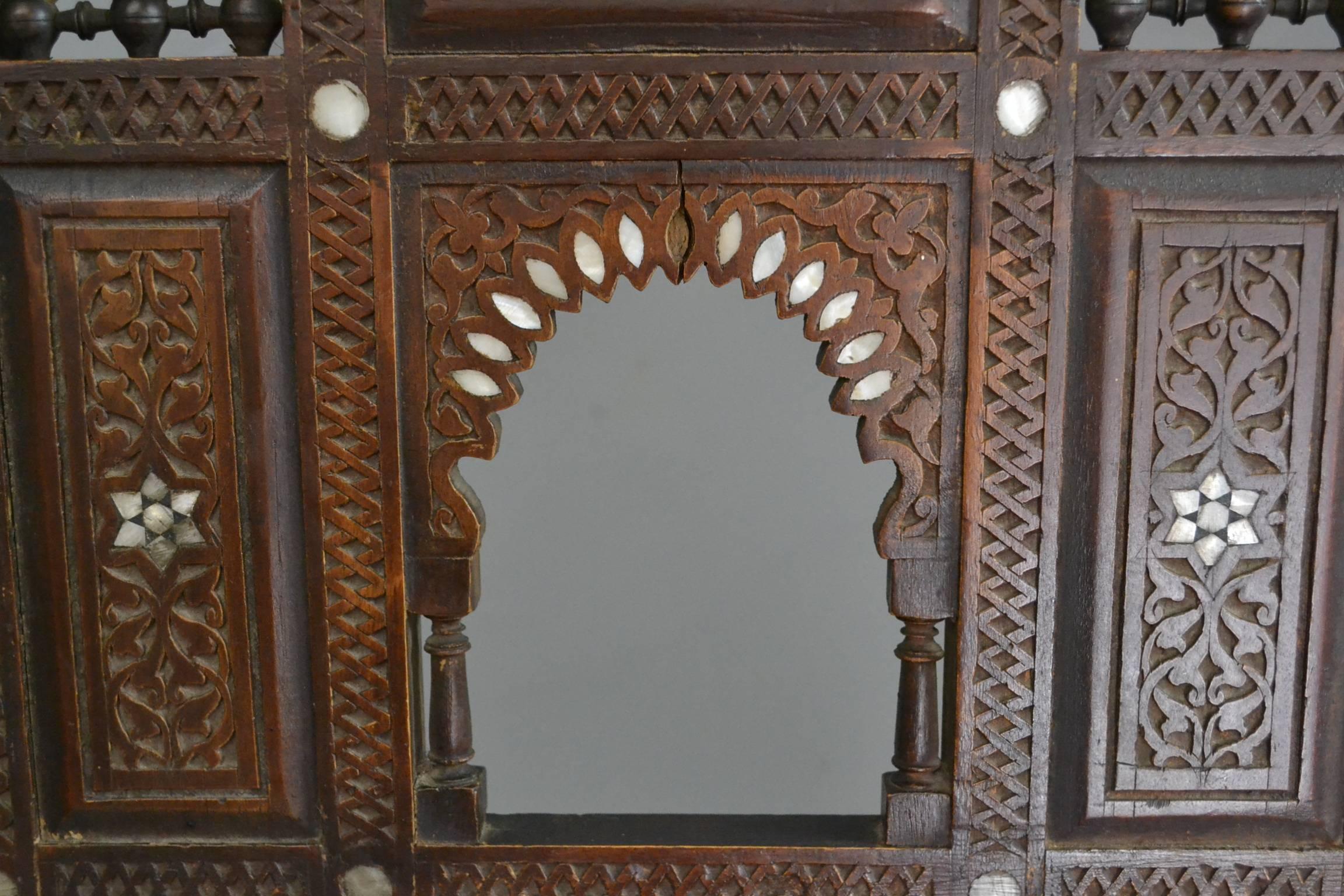 Early 20th Century Moorish Carved Teak and Inlaid Rocking Chair In Good Condition For Sale In Redruth, GB