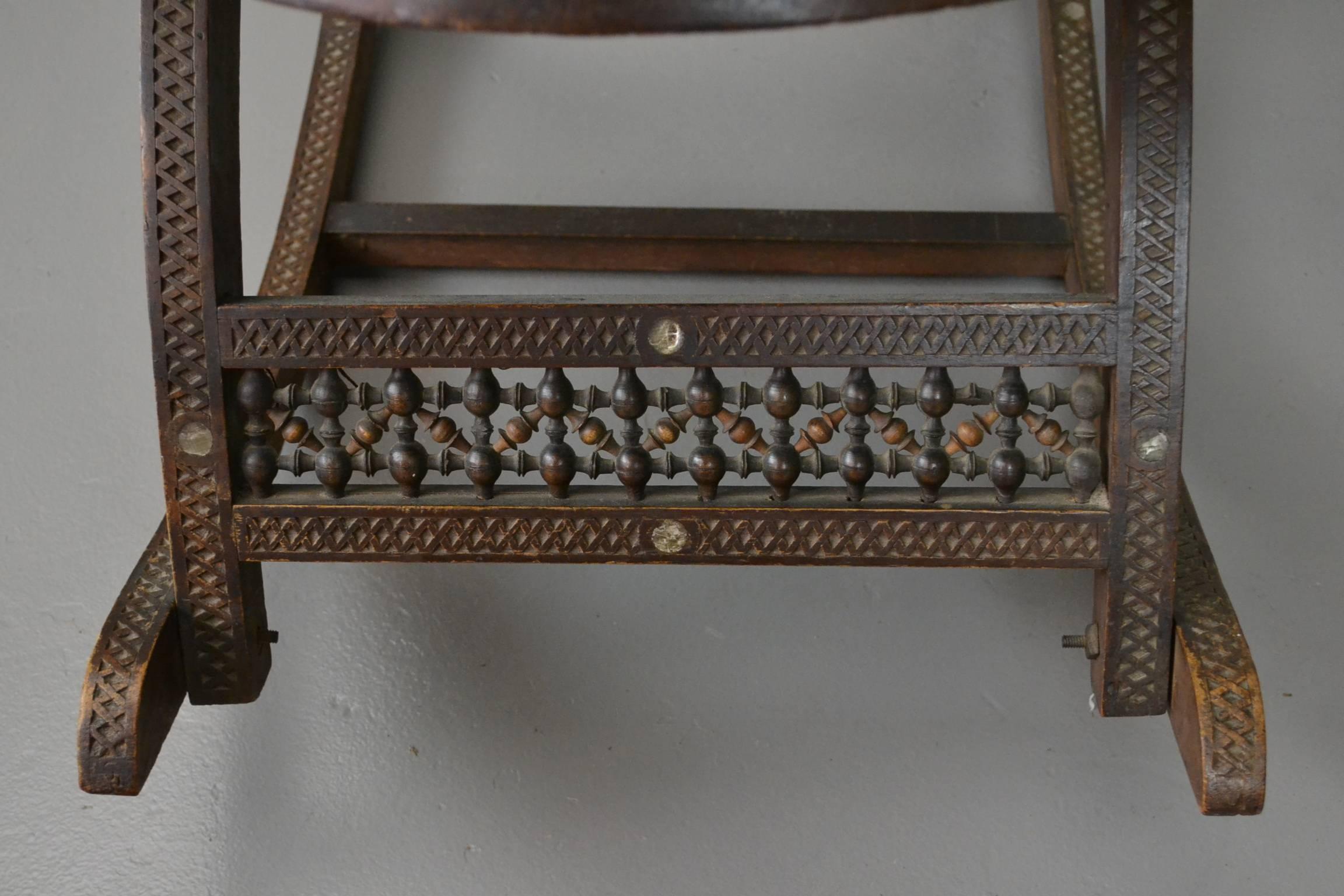 Early 20th Century Moorish Carved Teak and Inlaid Rocking Chair For Sale 2